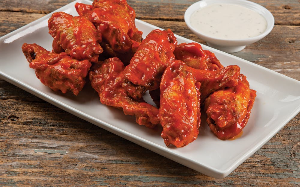 Order Bone In Wings - Half Order (1/2 Pound) food online from Godfather Pizza store, Dows on bringmethat.com