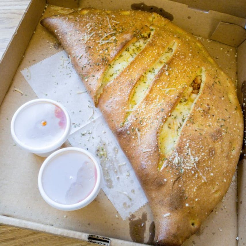 Order Italiano's Four Cheese Calzone - Small food online from Italiano's store, Blacksburg on bringmethat.com