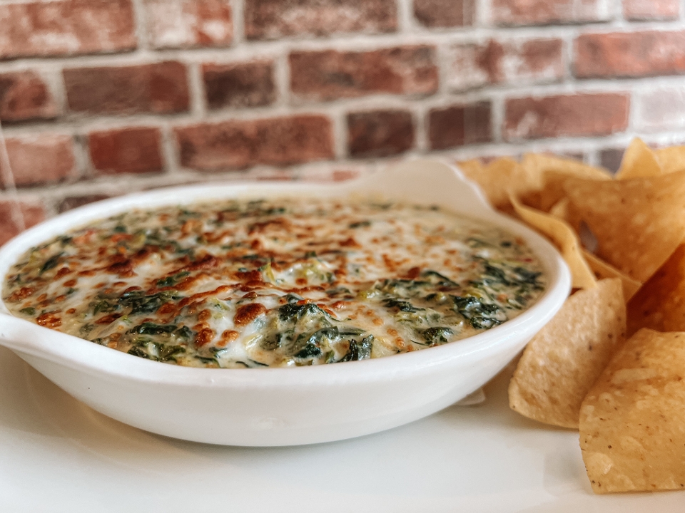 Order Baked Spinach Artichoke Dip food online from Urban American Kitchen store, Houston on bringmethat.com