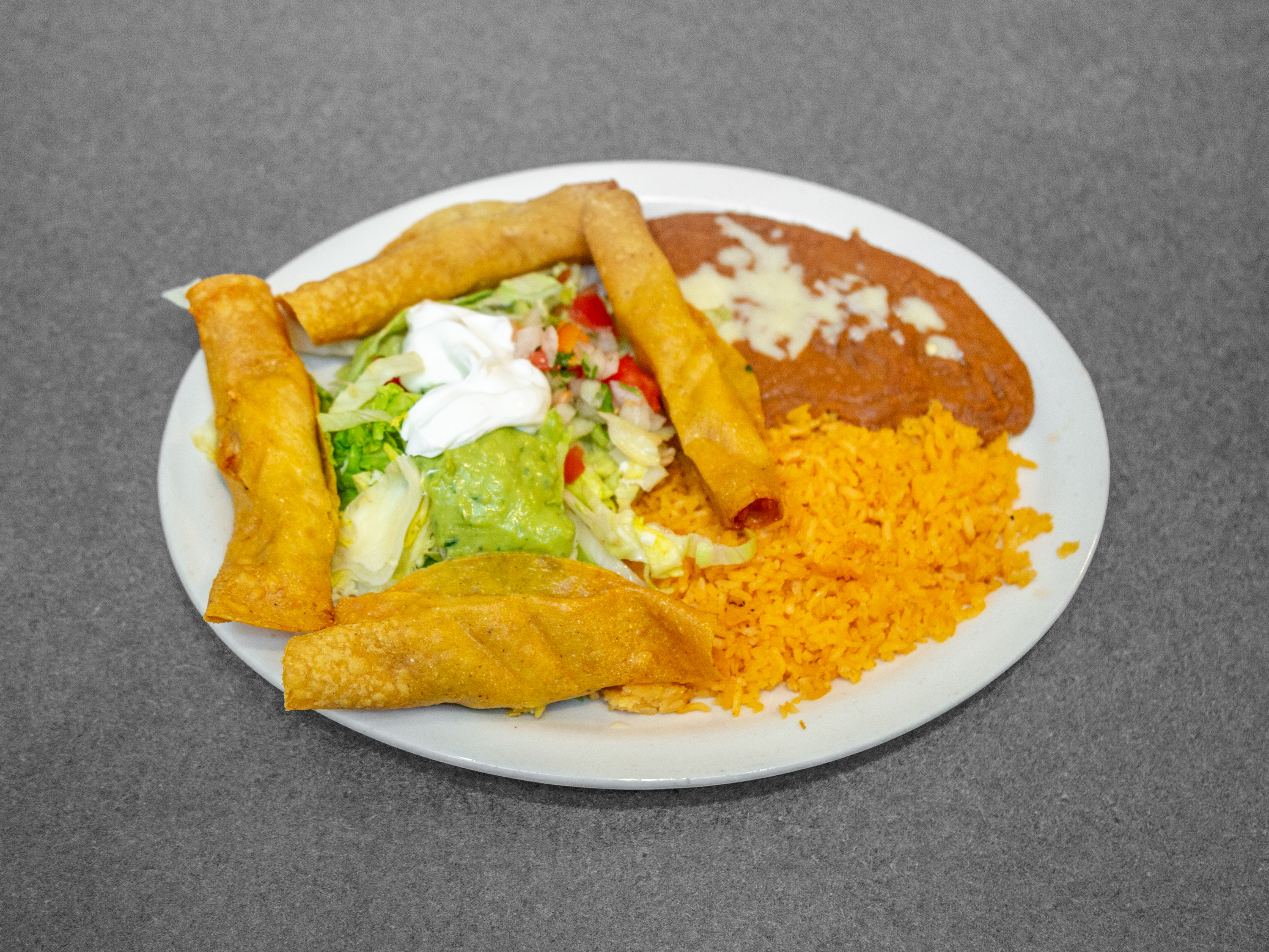 Order Flautas food online from La Familia Mexican Restaurant store, Rossville on bringmethat.com