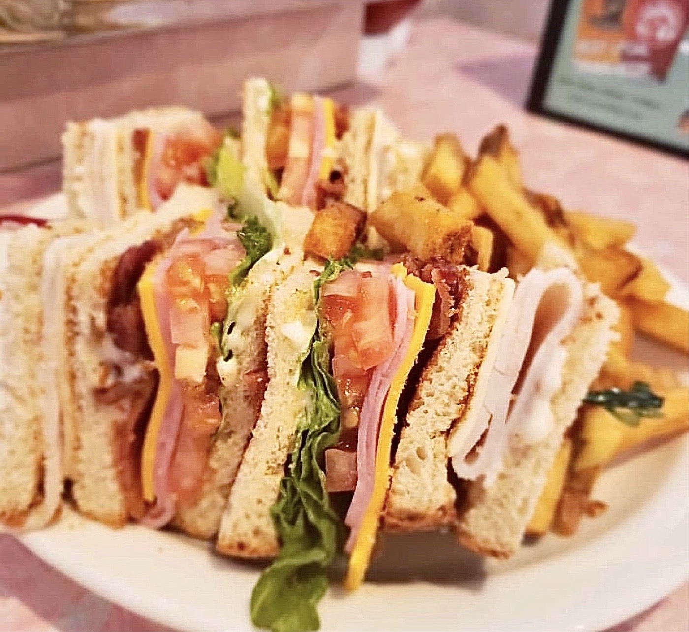 Order Club Sandwich food online from Rosies Diner store, Aurora on bringmethat.com