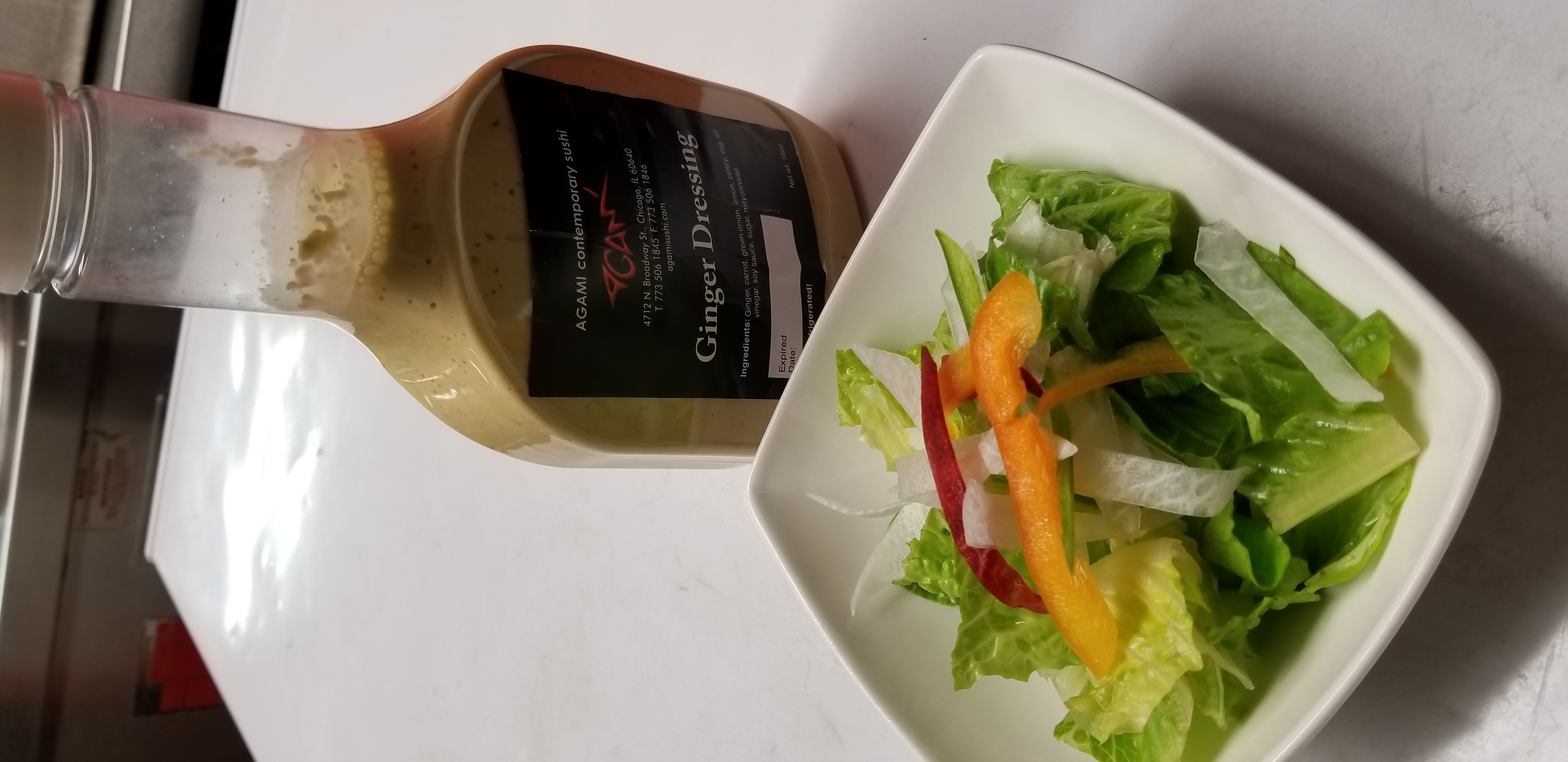 Order Salad Ginger Dressing BT food online from Agami Contemporary Sushi store, Chicago on bringmethat.com