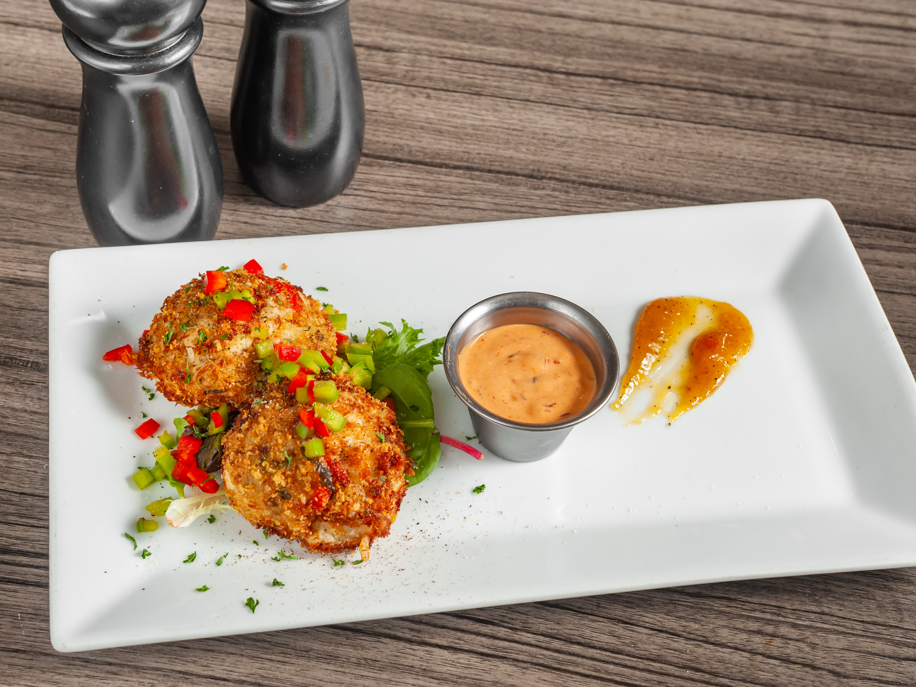 Order Crab Cakes food online from Hangar One Steakhouse store, Wichita on bringmethat.com