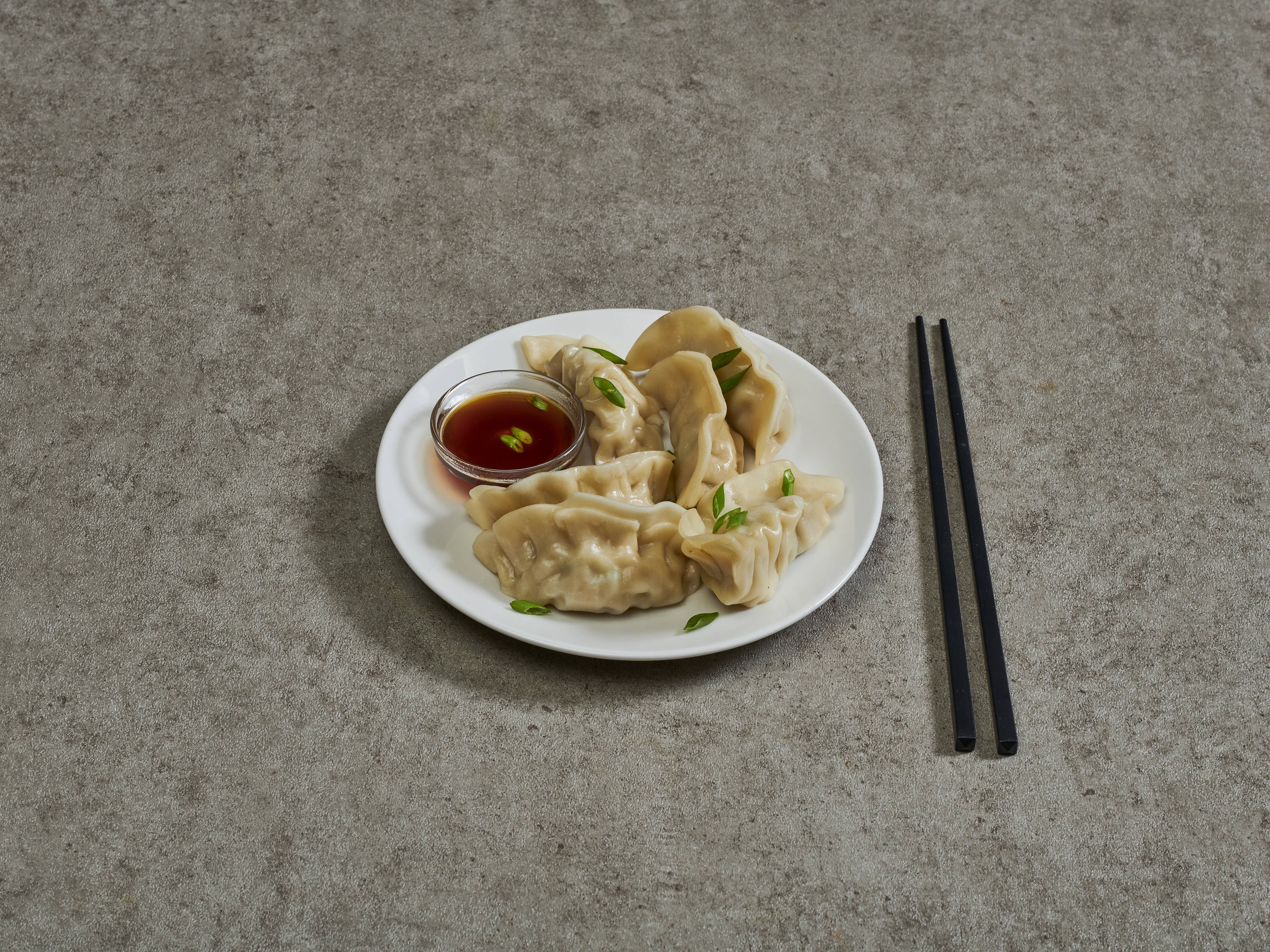 Order 3. 8 Steamed Dumplings food online from Empire Palace store, Fort Collins on bringmethat.com