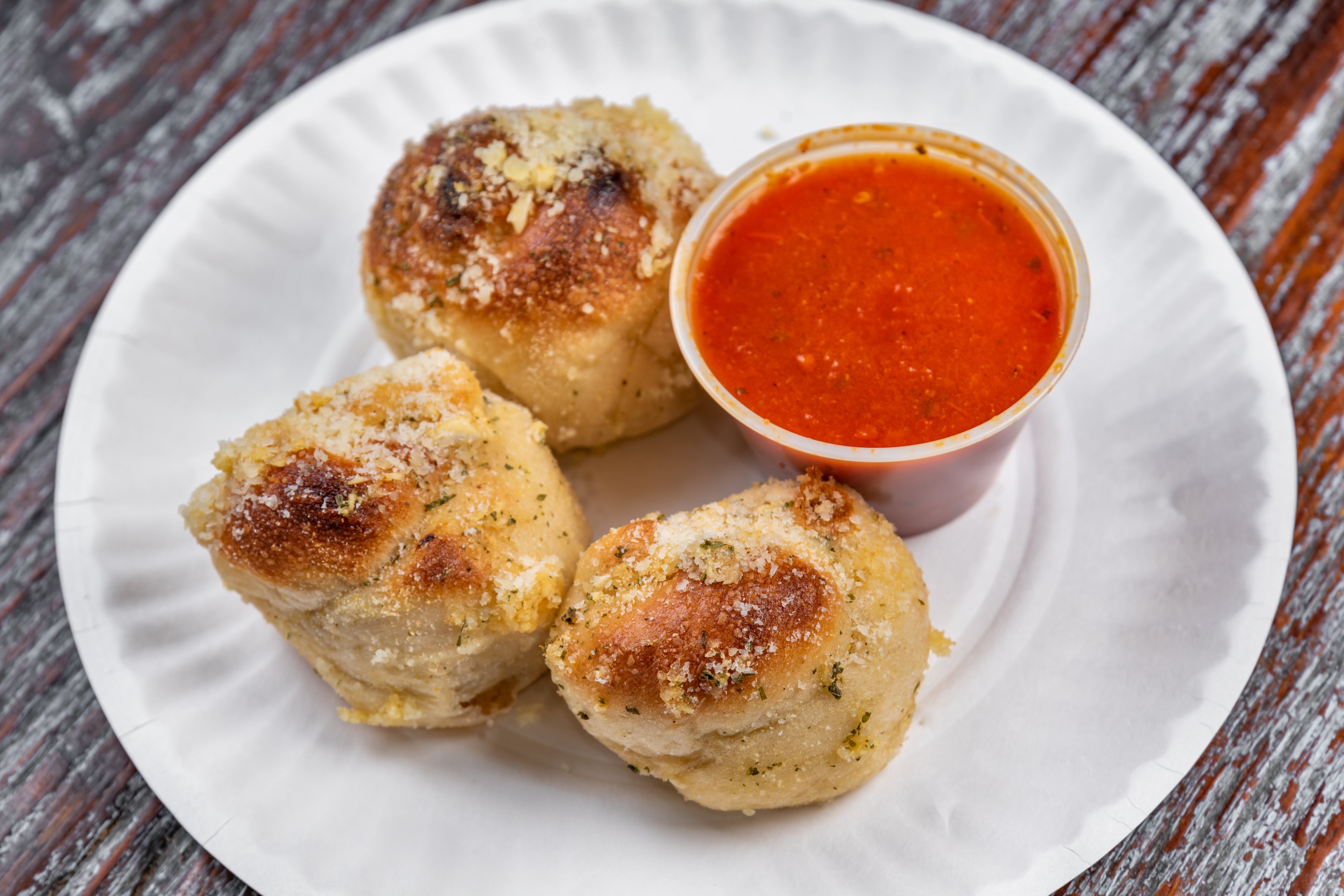 Order Fresh Baked Garlic Knots - 3 Pieces food online from Pizza republic store, Hoboken on bringmethat.com