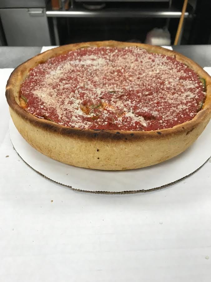 Order Deep Dish Pan Pizza - Medium 10'' (Serves 1-2) food online from Middy Mags Pizzeria store, Glenview on bringmethat.com