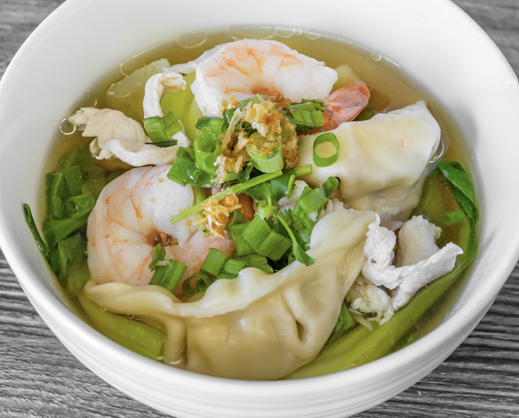 Order Dumpling Soup food online from Sriracha Thai Restaurant store, Carson on bringmethat.com