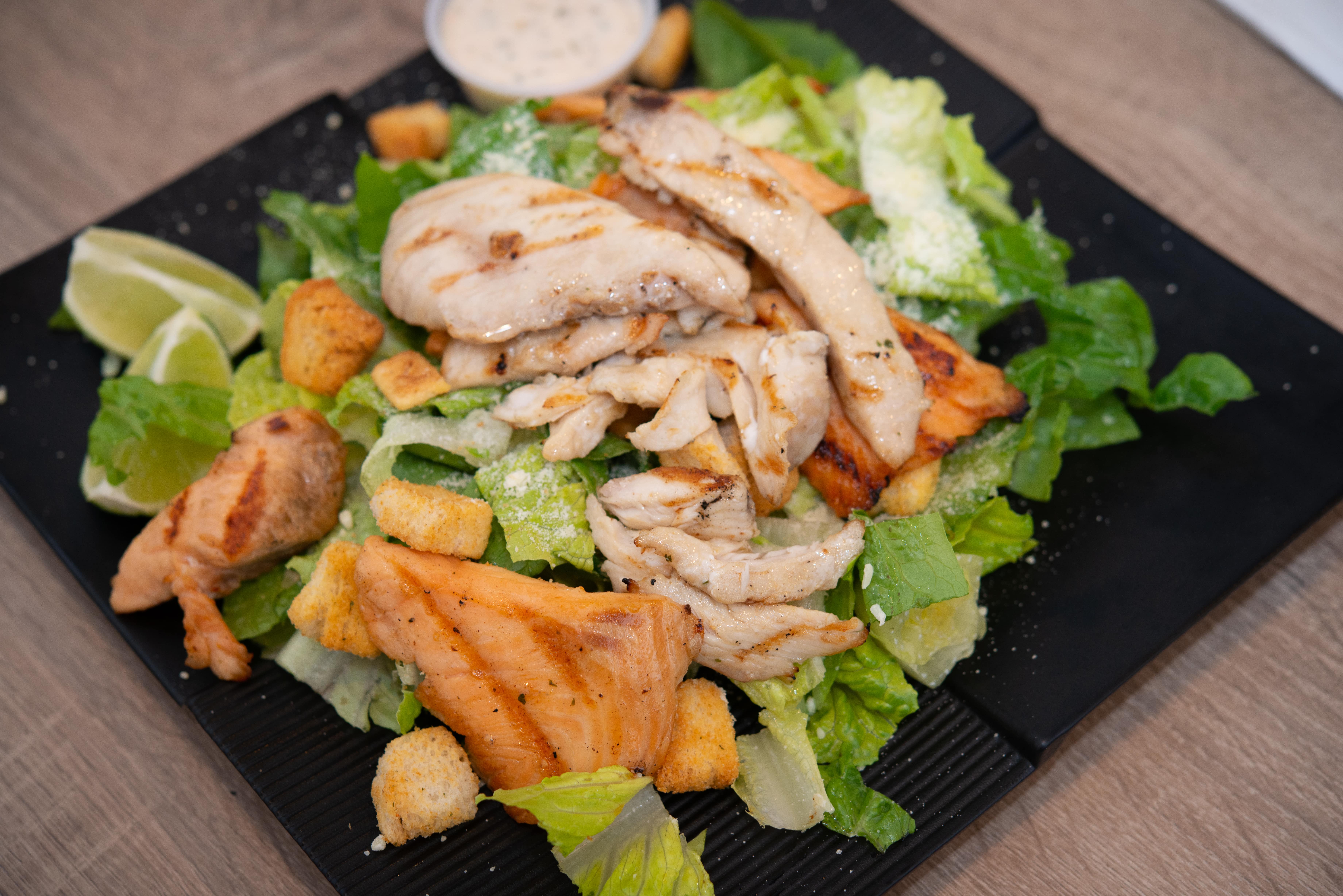 Order Caesar Salad with Grilled Mixed Fish food online from Fish's Wild store, San Jose on bringmethat.com