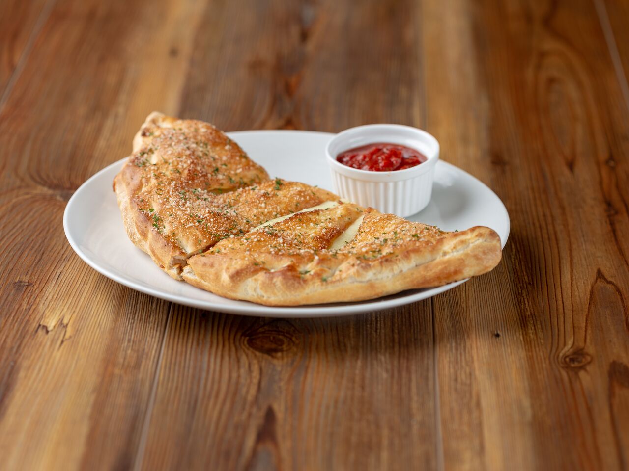 Order Cheese Calzone food online from Romeo's Pizza and Pasta store, Wadsworth on bringmethat.com