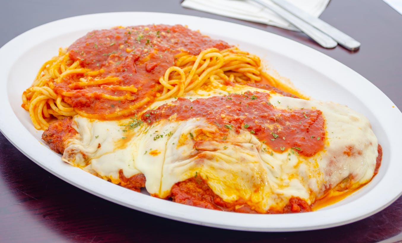 Order Grilled Chicken Parmigiana - Entree food online from Mulberry Street Pizza store, Newark on bringmethat.com