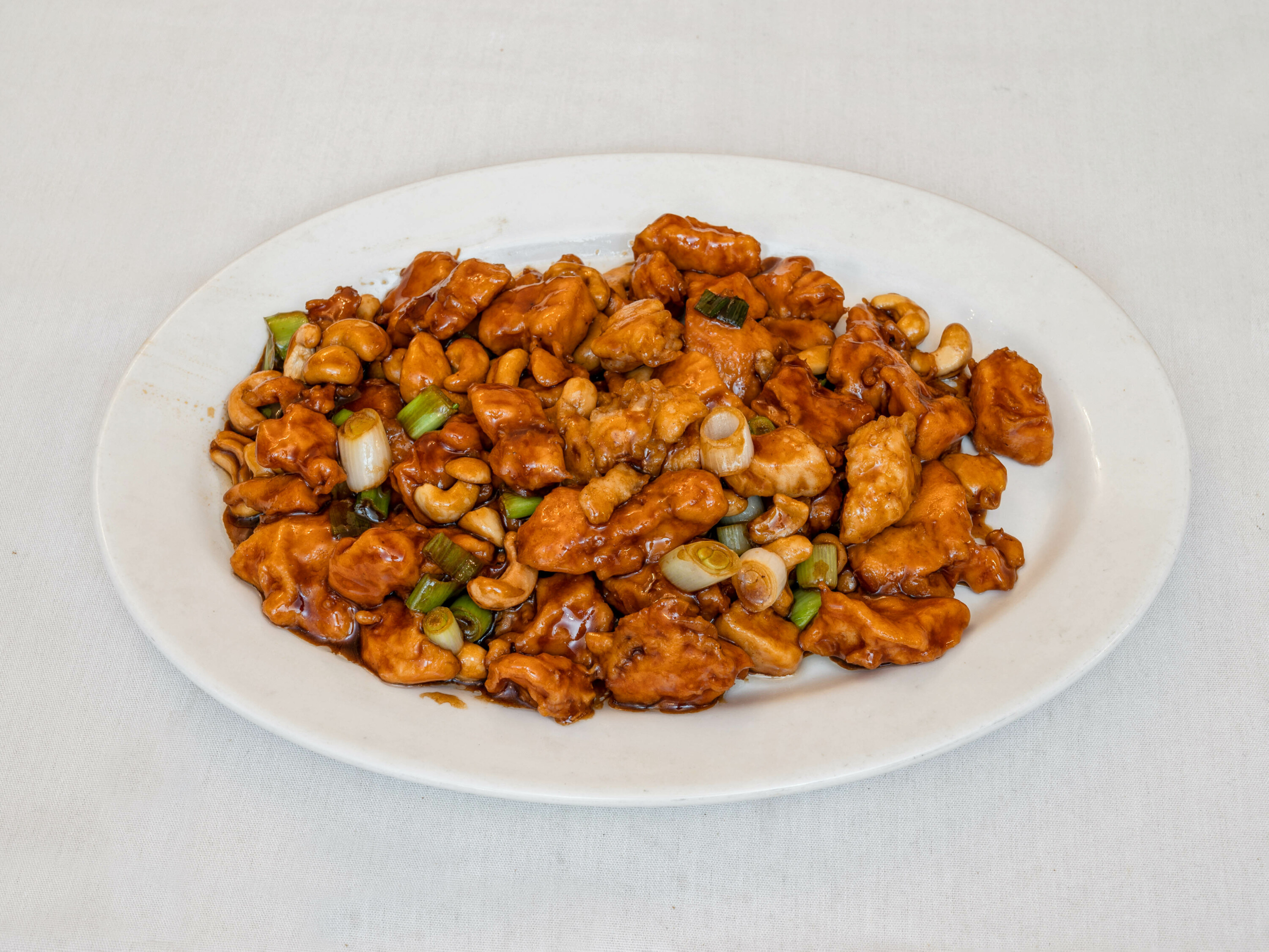 Order 56. Sauteed Chicken with Cashew Nuts food online from Wu Liang Ye store, New York on bringmethat.com