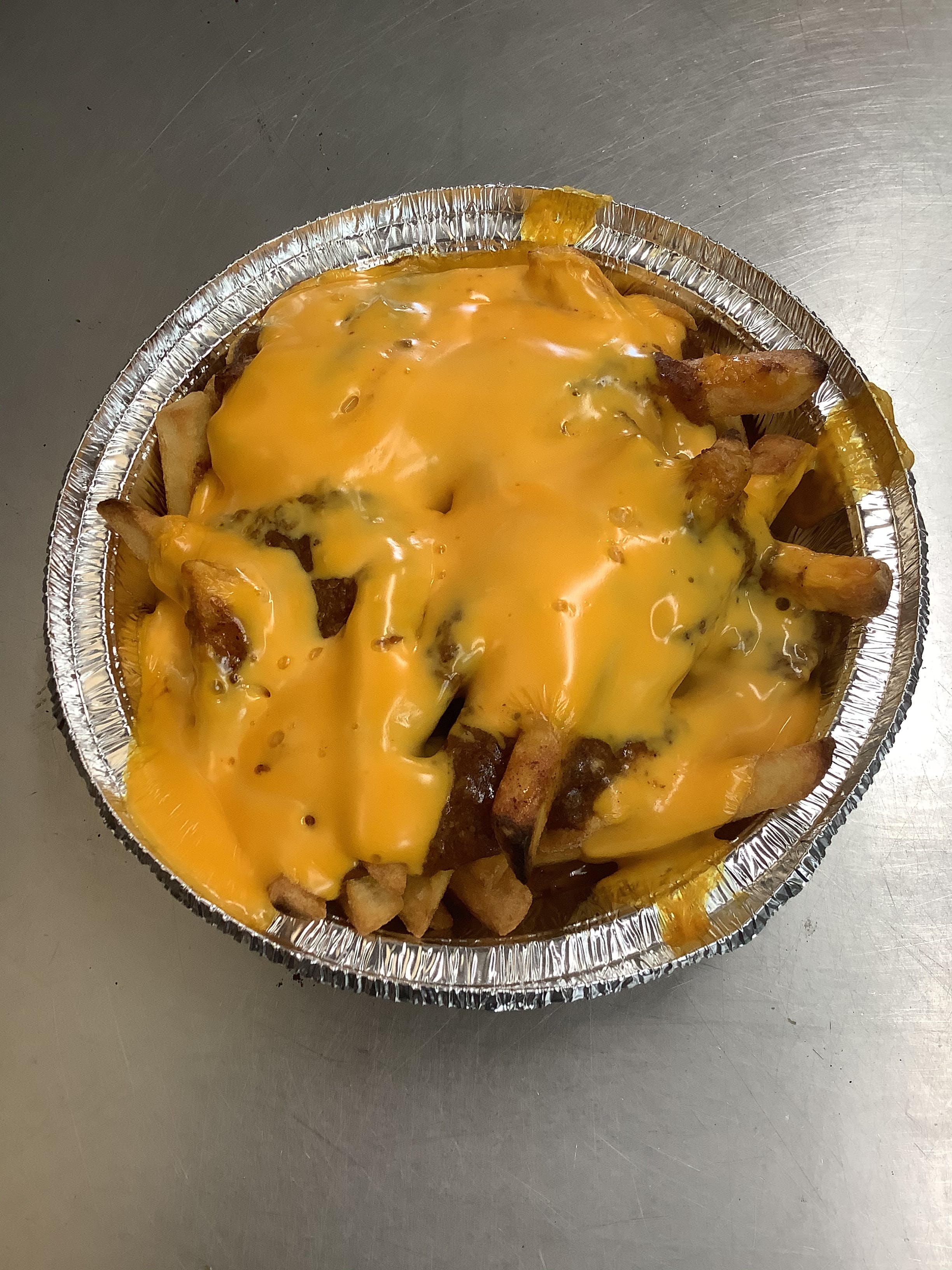 Order Chili Cheese Fries - Side food online from Philly Grill - Diane Ave store, San Diego on bringmethat.com