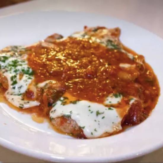 Order Veal Parmigiana food online from Tommaso store, San Francisco on bringmethat.com