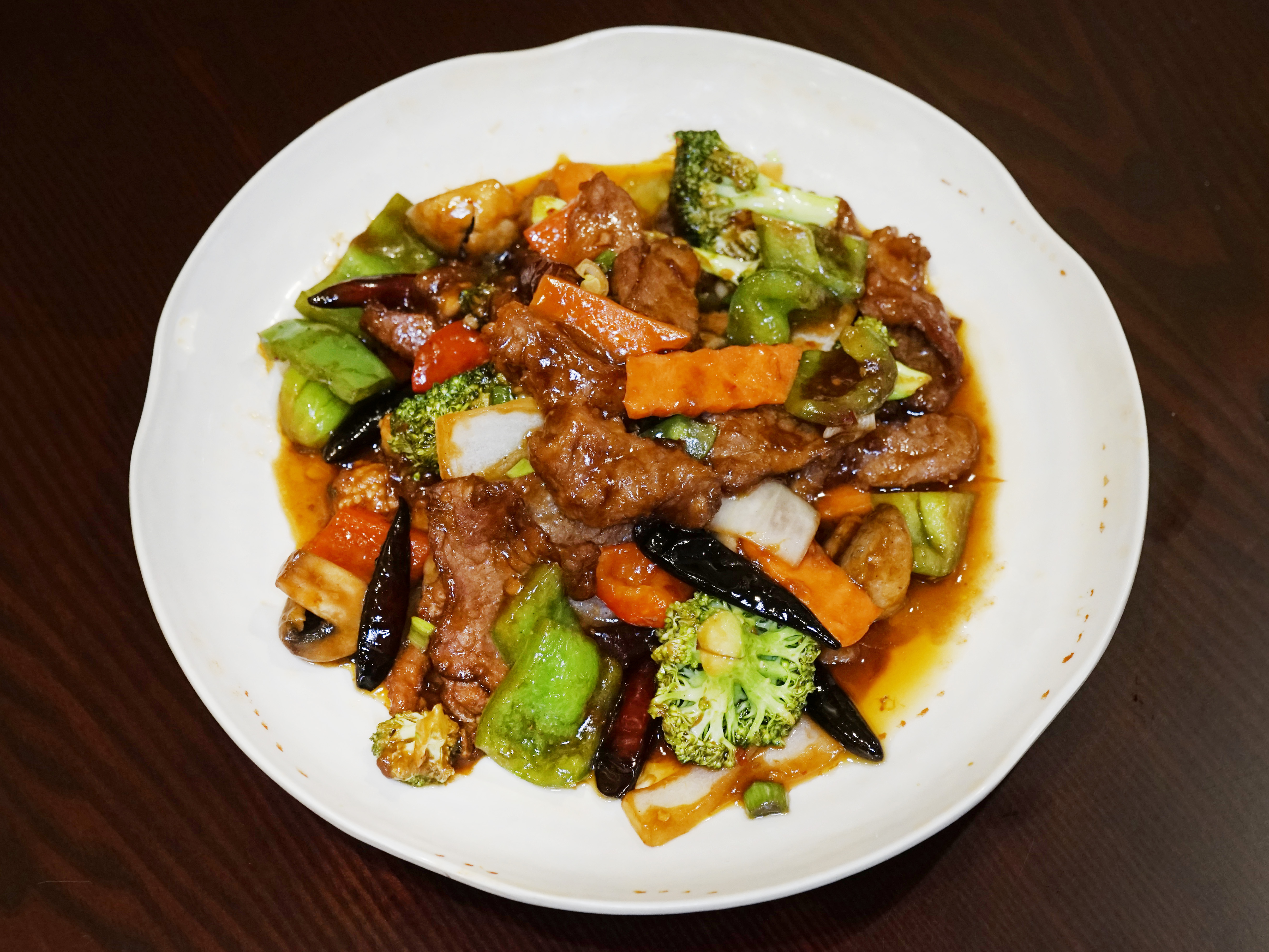 Order 75. Hunan Beef food online from Taste Kitchen store, New York on bringmethat.com