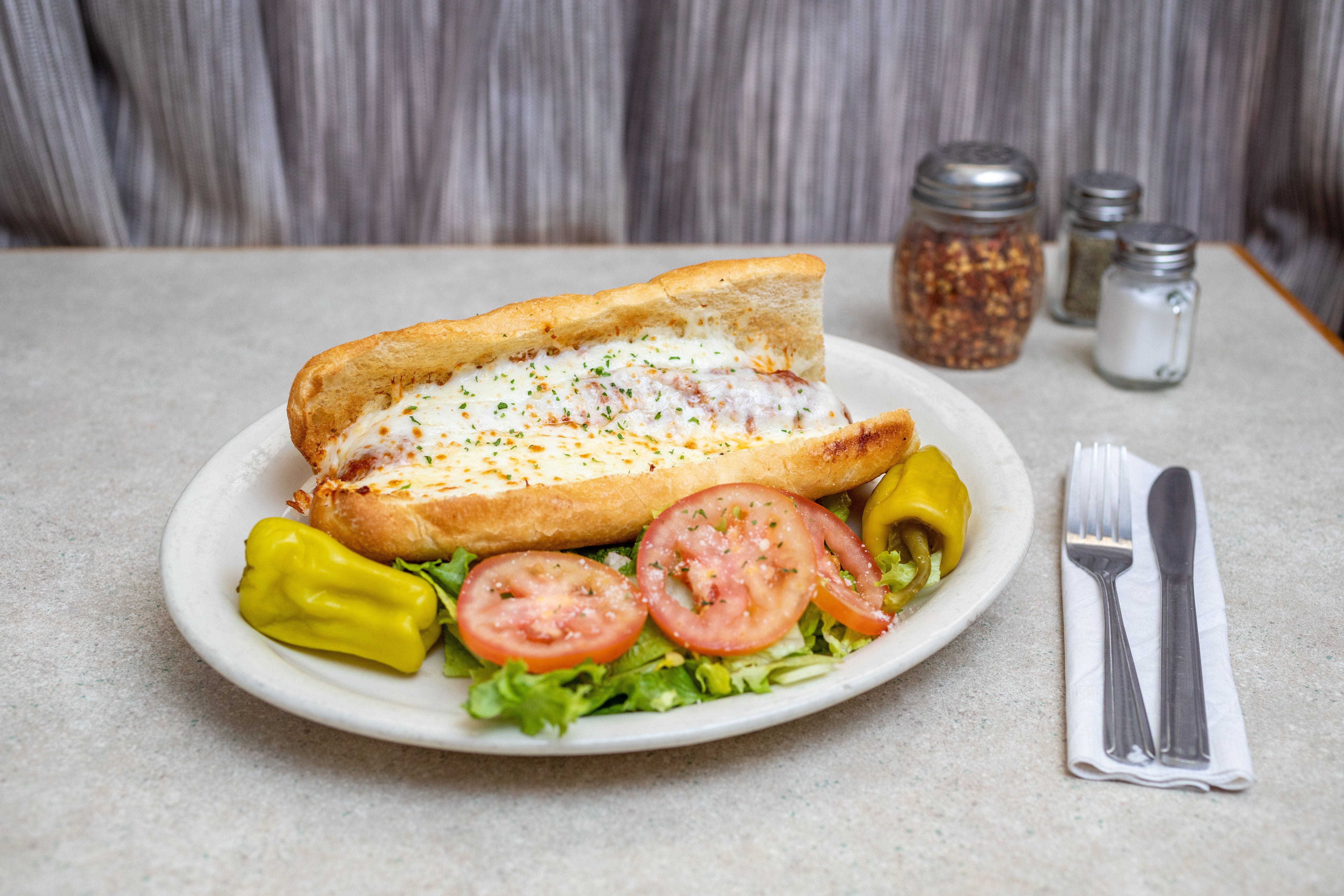 Order Homemade Sausage Sandwich - Sandwich food online from Saucy's Pizza store, Littleton on bringmethat.com