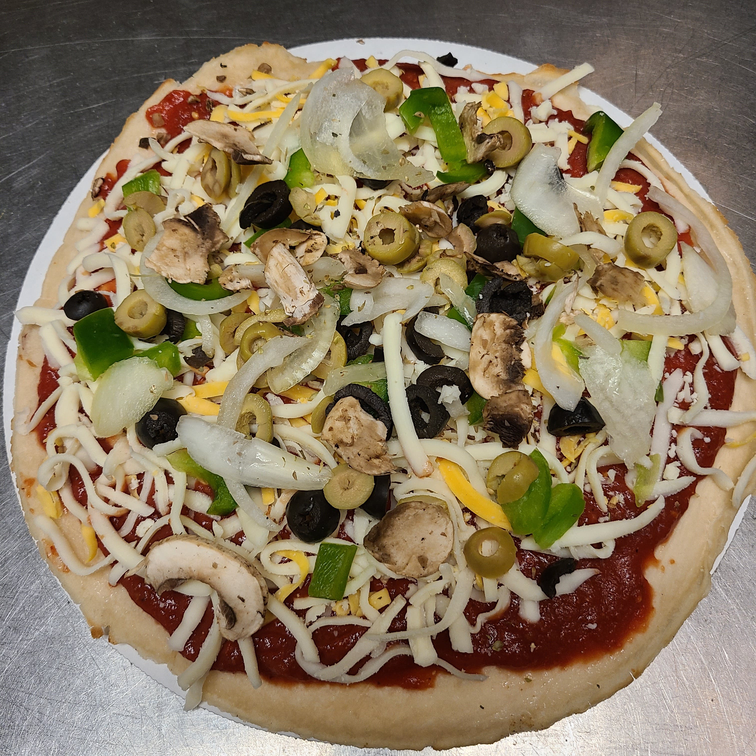 Order Gluten Free Vegetarian Take & Bake Pizza - 10'' (Serves 1-2) food online from Timber Creek Pizza Co store, Lake Mills on bringmethat.com