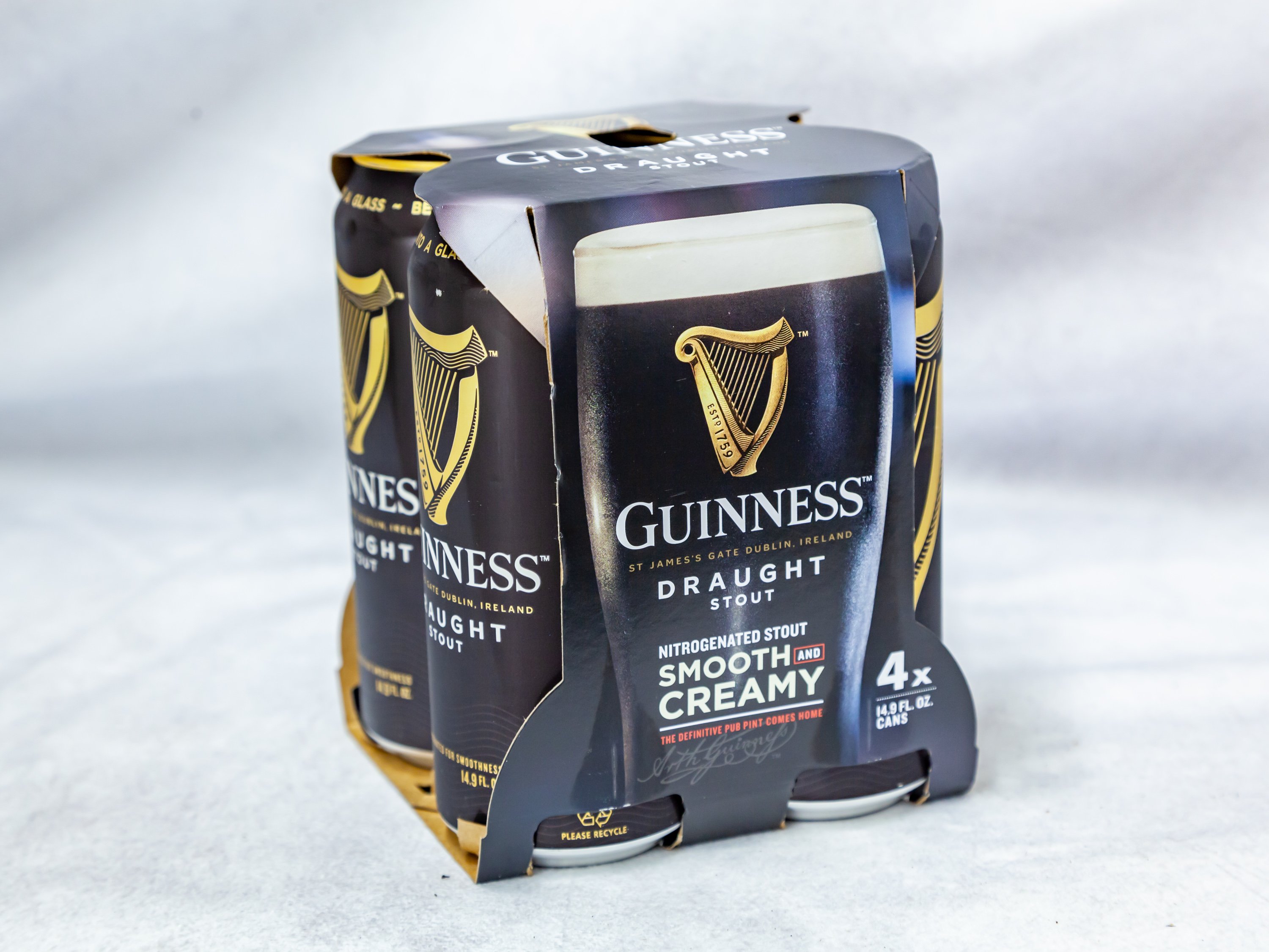 Order 4 Pack Cans Guinness Draught Stout Smooth and Creamy food online from Gallaghers Drive-In Liquor store, Oakland on bringmethat.com