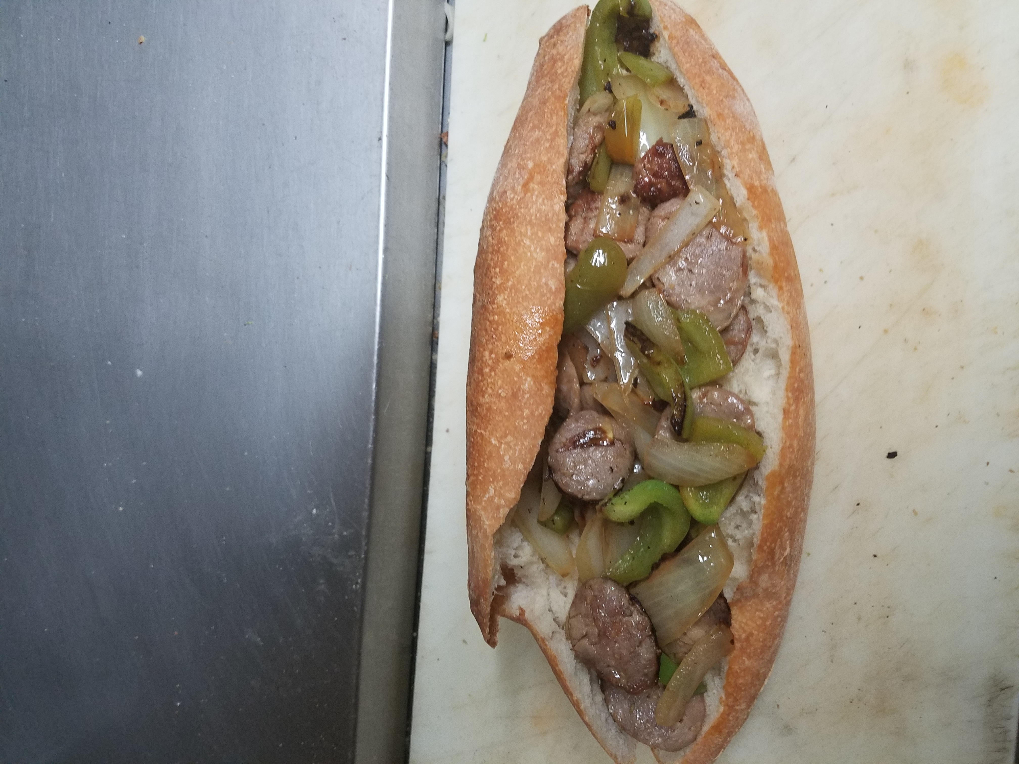 Order Sausage, Peppers and Onions Hot Sub food online from Our Place Pizza & Catering store, Edison on bringmethat.com