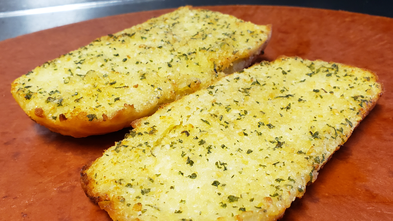 Order Garlic Bread food online from Round Table Pizza store, San Jose on bringmethat.com