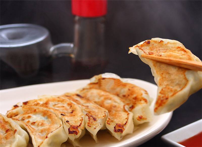Order A12. Fried Chinese Pot Stickers 北平锅贴 food online from Millions Of Milk Tea store, Columbus on bringmethat.com