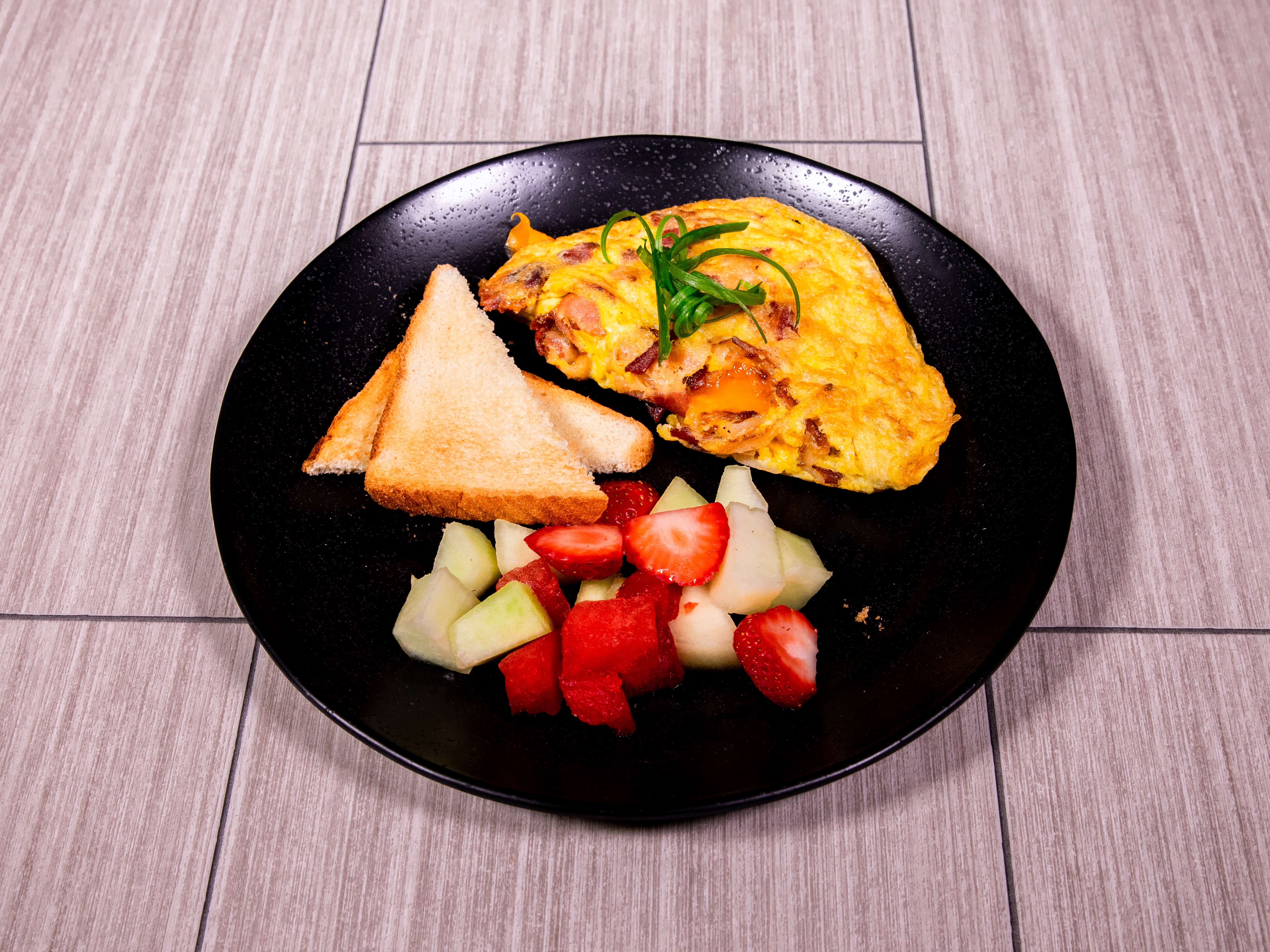Order Bacon and Cheddar Omelette food online from Kitchen Cafe store, Dallas on bringmethat.com