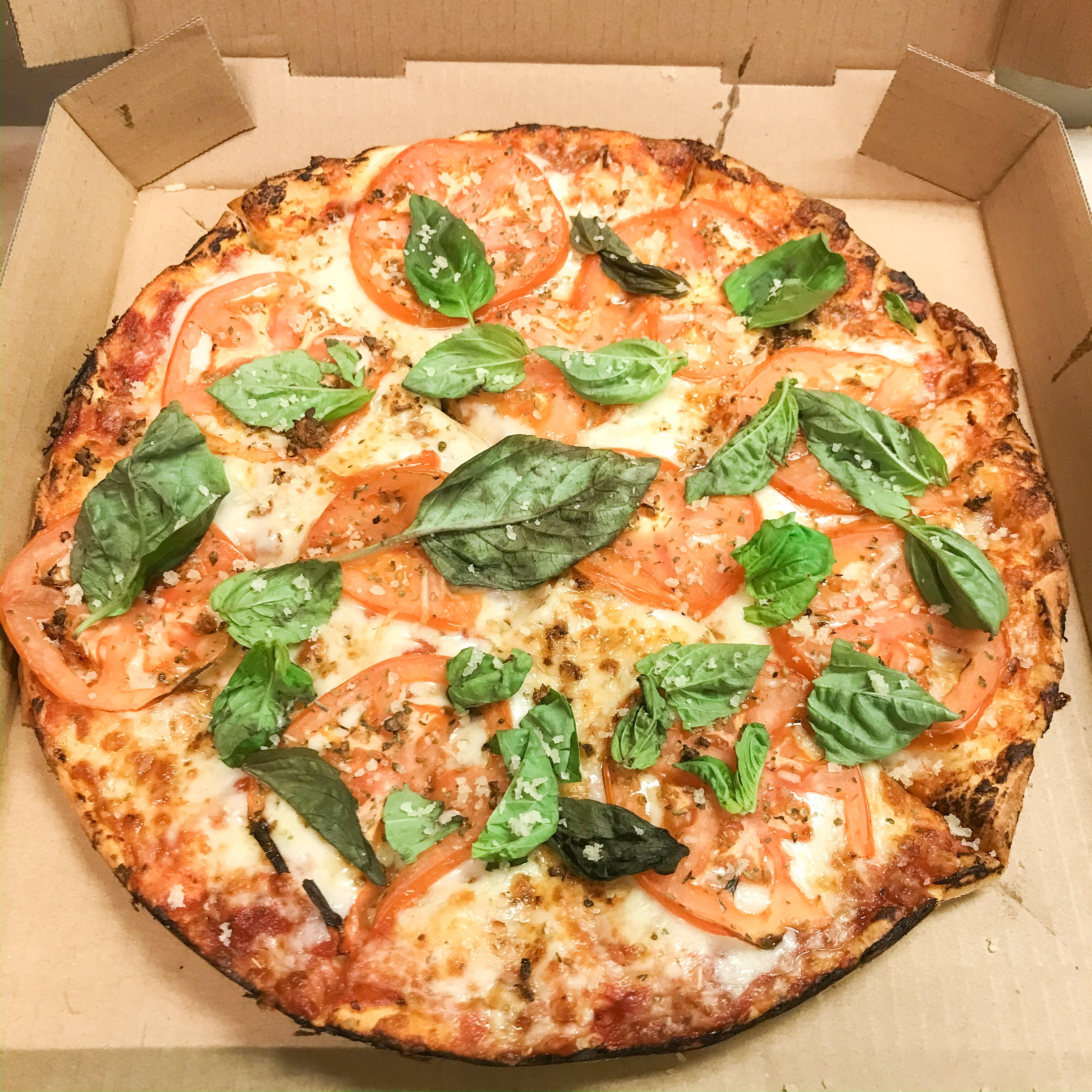 Order Margherita Pizza food online from Magnolia Pizza & Pasta store, Seattle on bringmethat.com