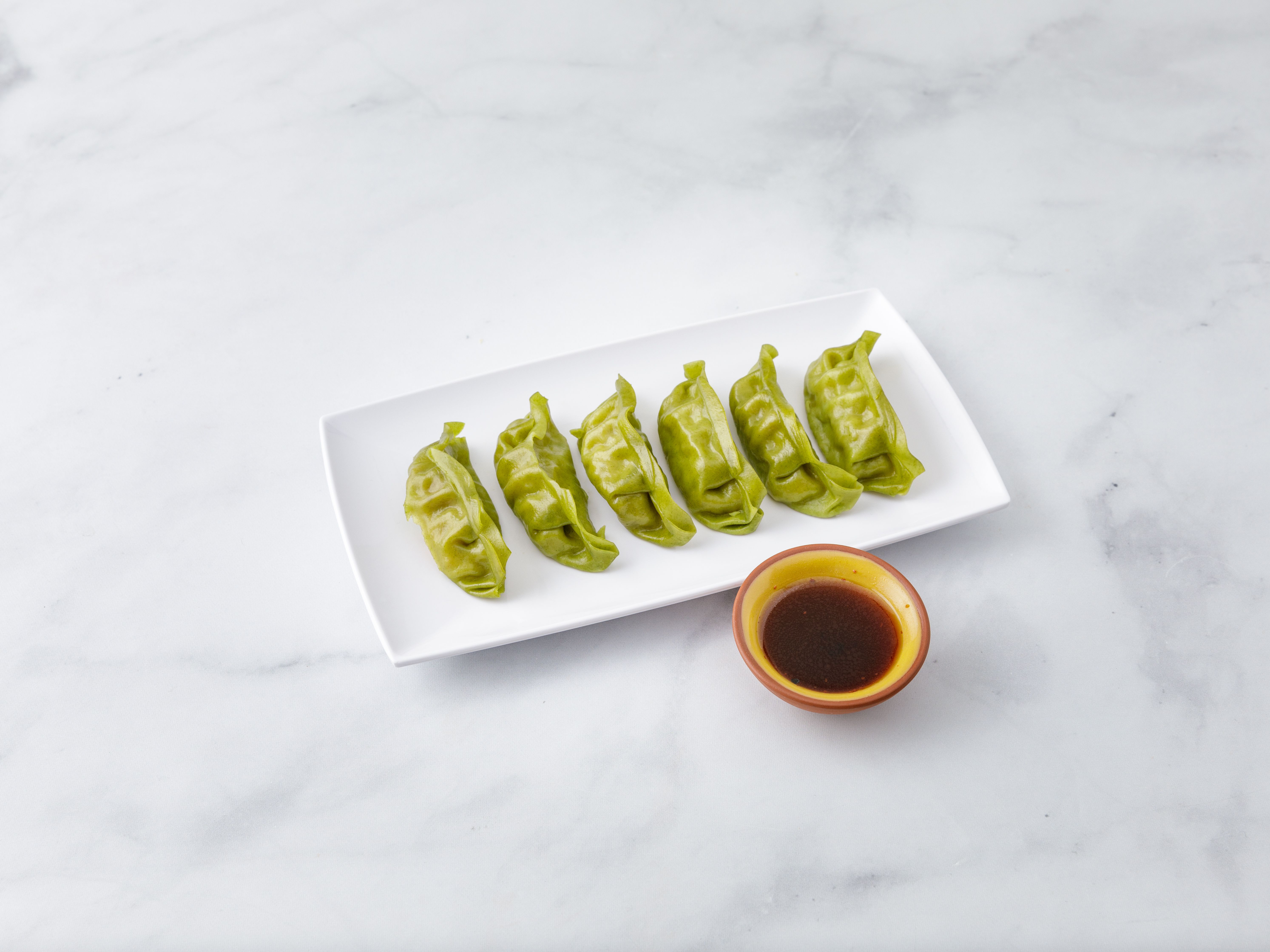 Order A15. Steamed Vegetable Dumplings food online from Luanne's Wild Ginger - Broome store, New York on bringmethat.com