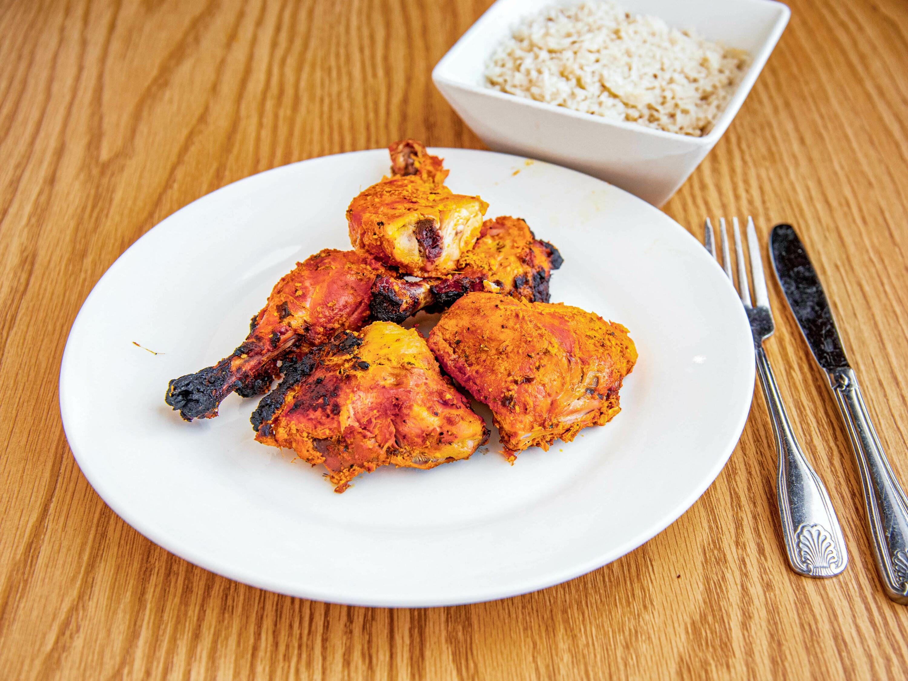 Order Tandoori Chicken food online from Nawab Fine Indian Cuisine store, Charleston on bringmethat.com