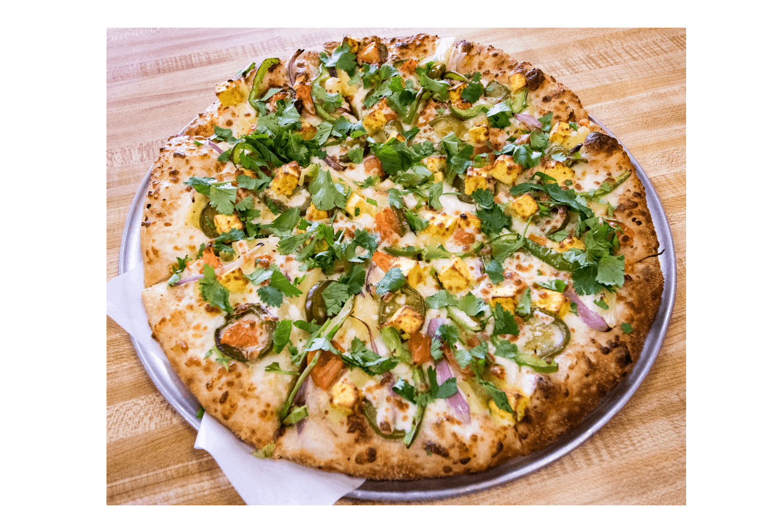 Order Indian Garlic Paneer Pizza - Personal 8'' food online from Happy Pizza store, Manteca on bringmethat.com