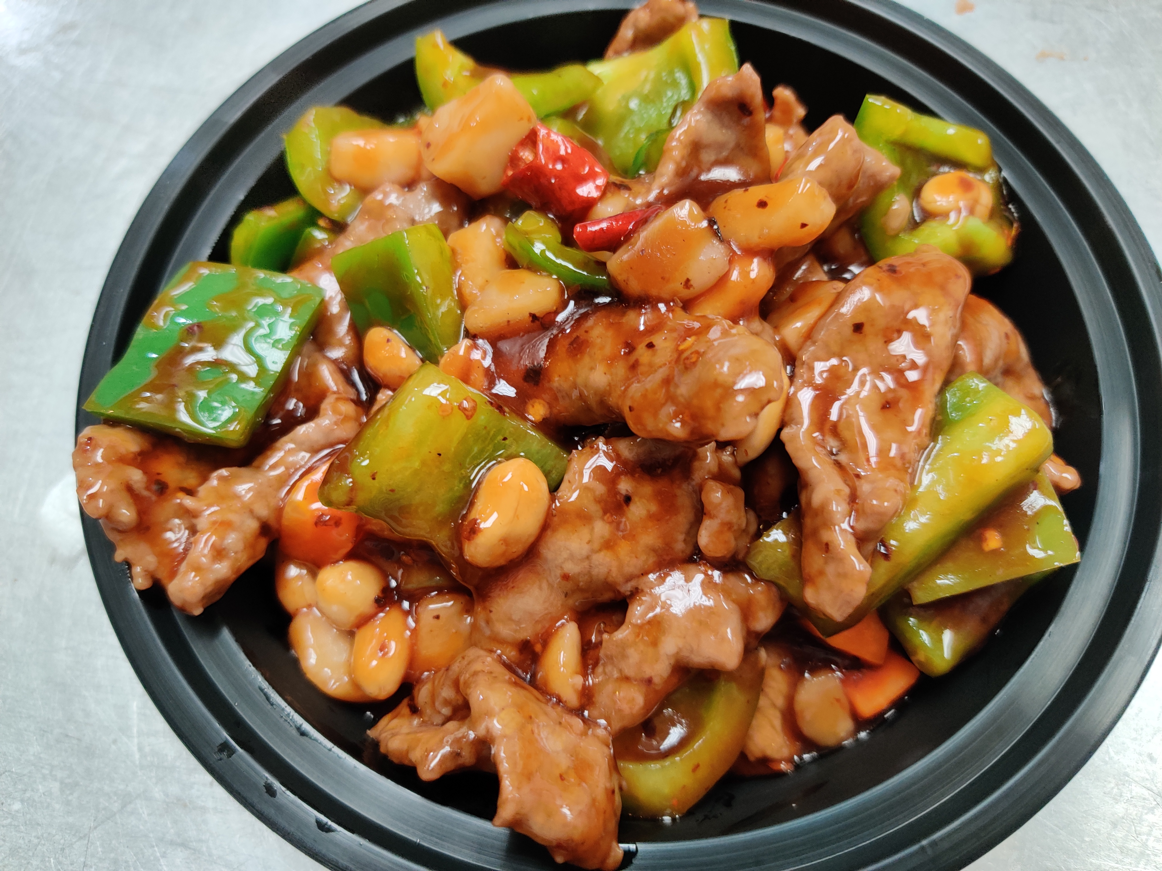 Order B8. Kung Po Beef with Peanuts food online from Sam Cafe store, Houston on bringmethat.com