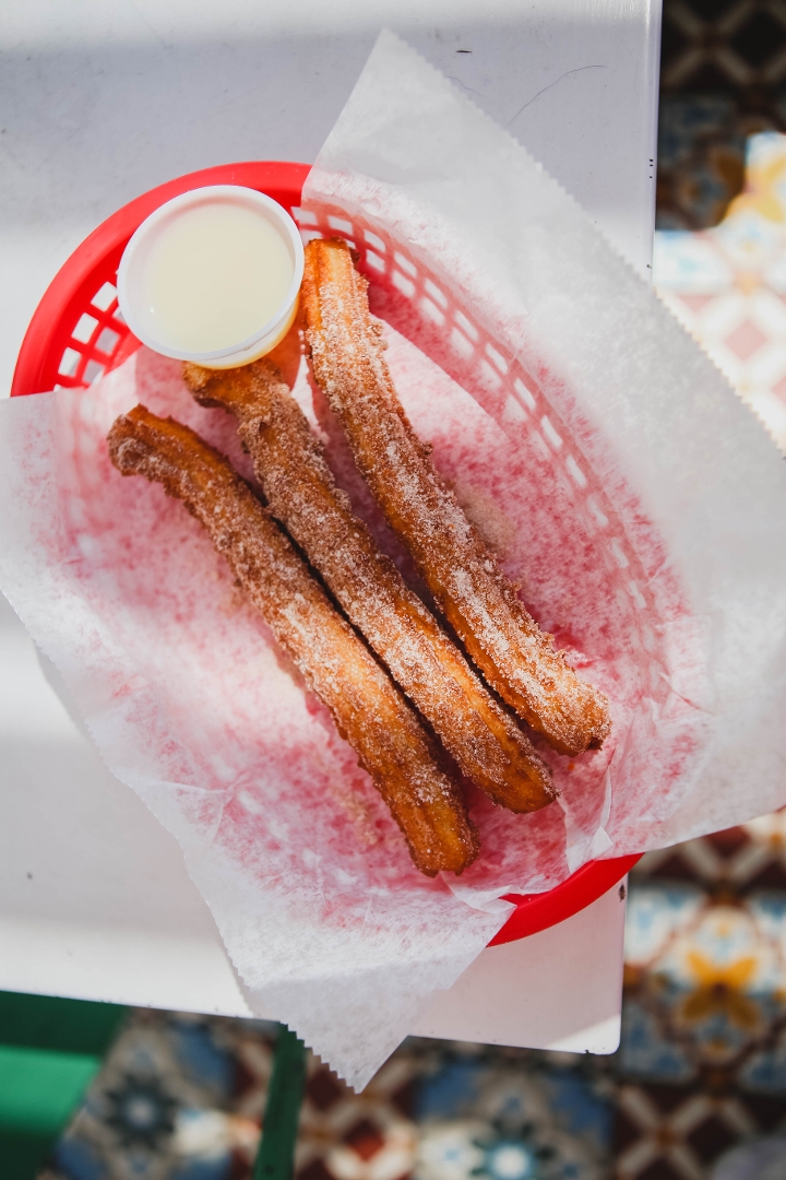 Order CHURROS food online from The Taco Stand store, San Diego on bringmethat.com