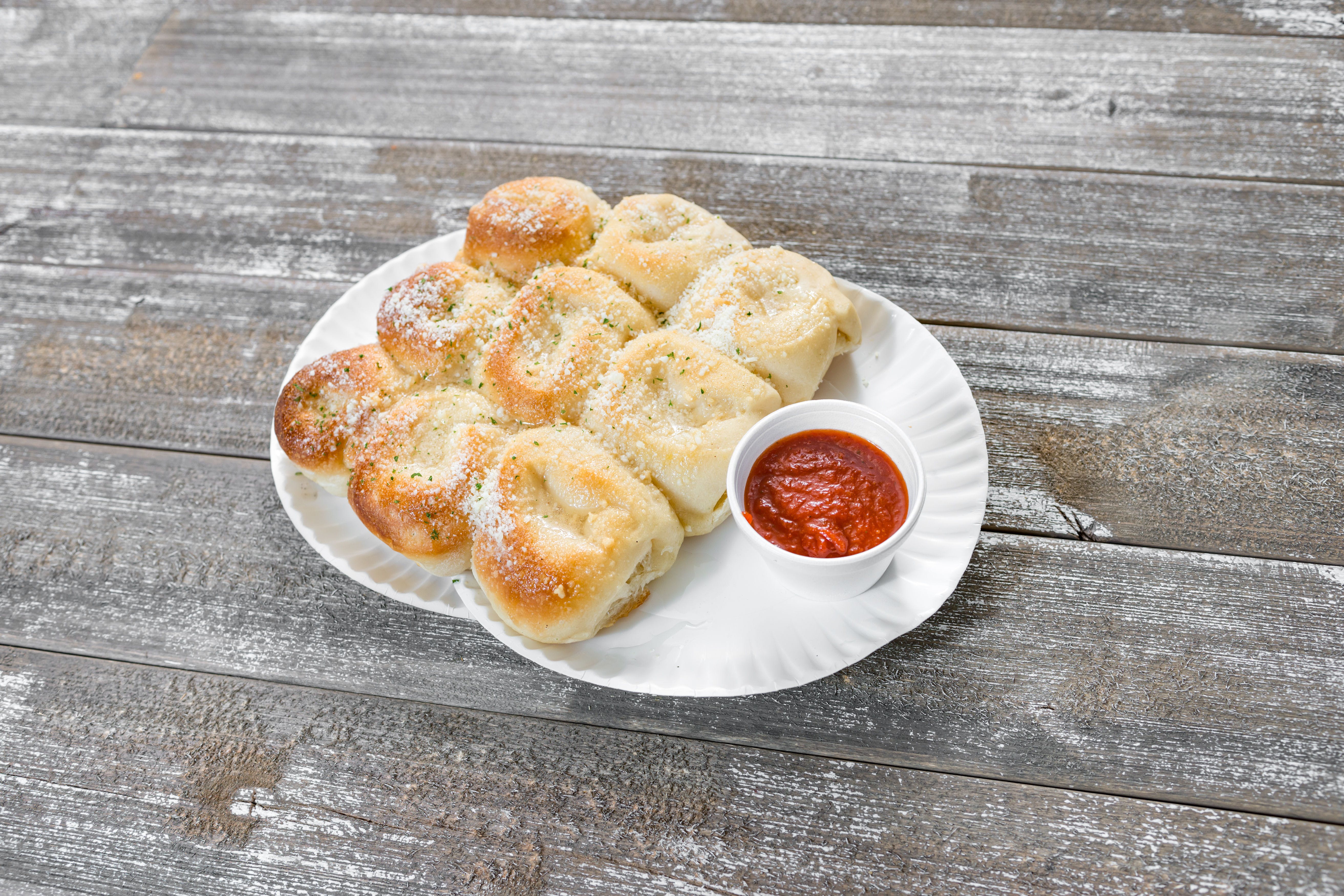 Order Garlic Knots - 12 Pieces food online from Piero Pizzeria store, Reading on bringmethat.com