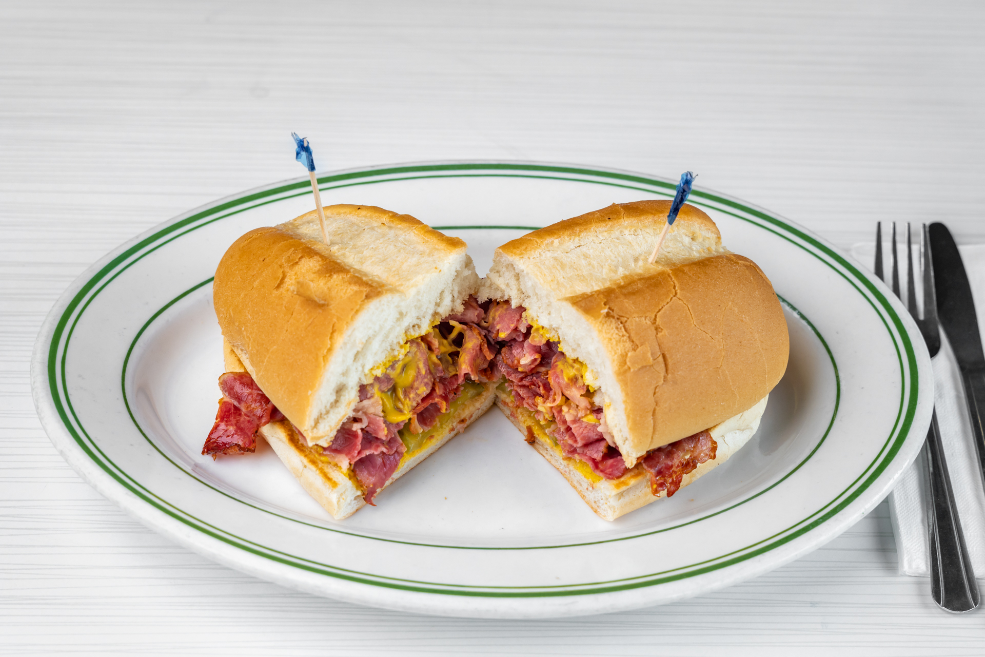 Order Pastrami Sandwich  food online from Goody Cafe store, Palm Desert on bringmethat.com