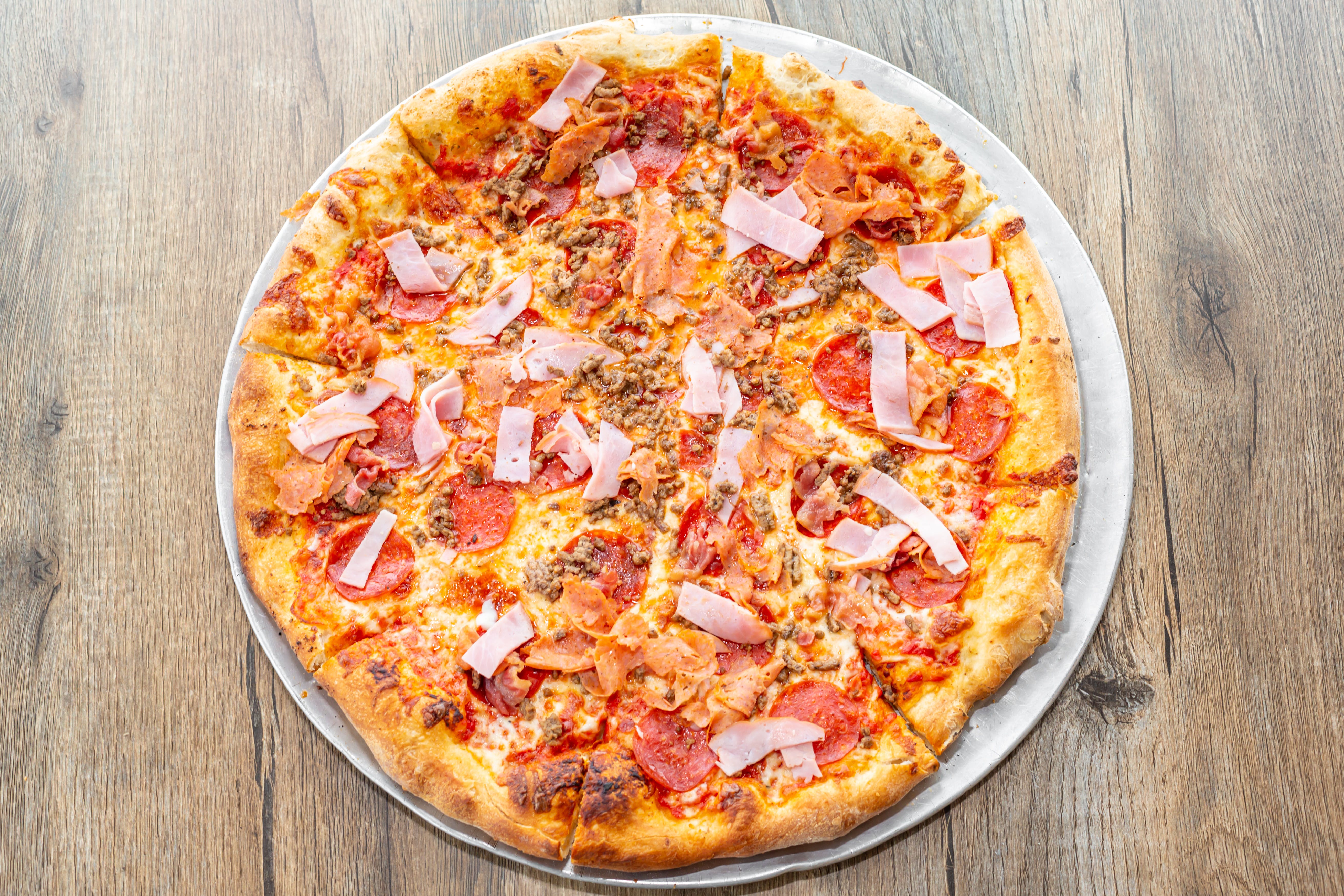 Order Meat Lover's Pizza - Small Gluten-Free food online from Db Pizzeria & Pub store, Halifax on bringmethat.com