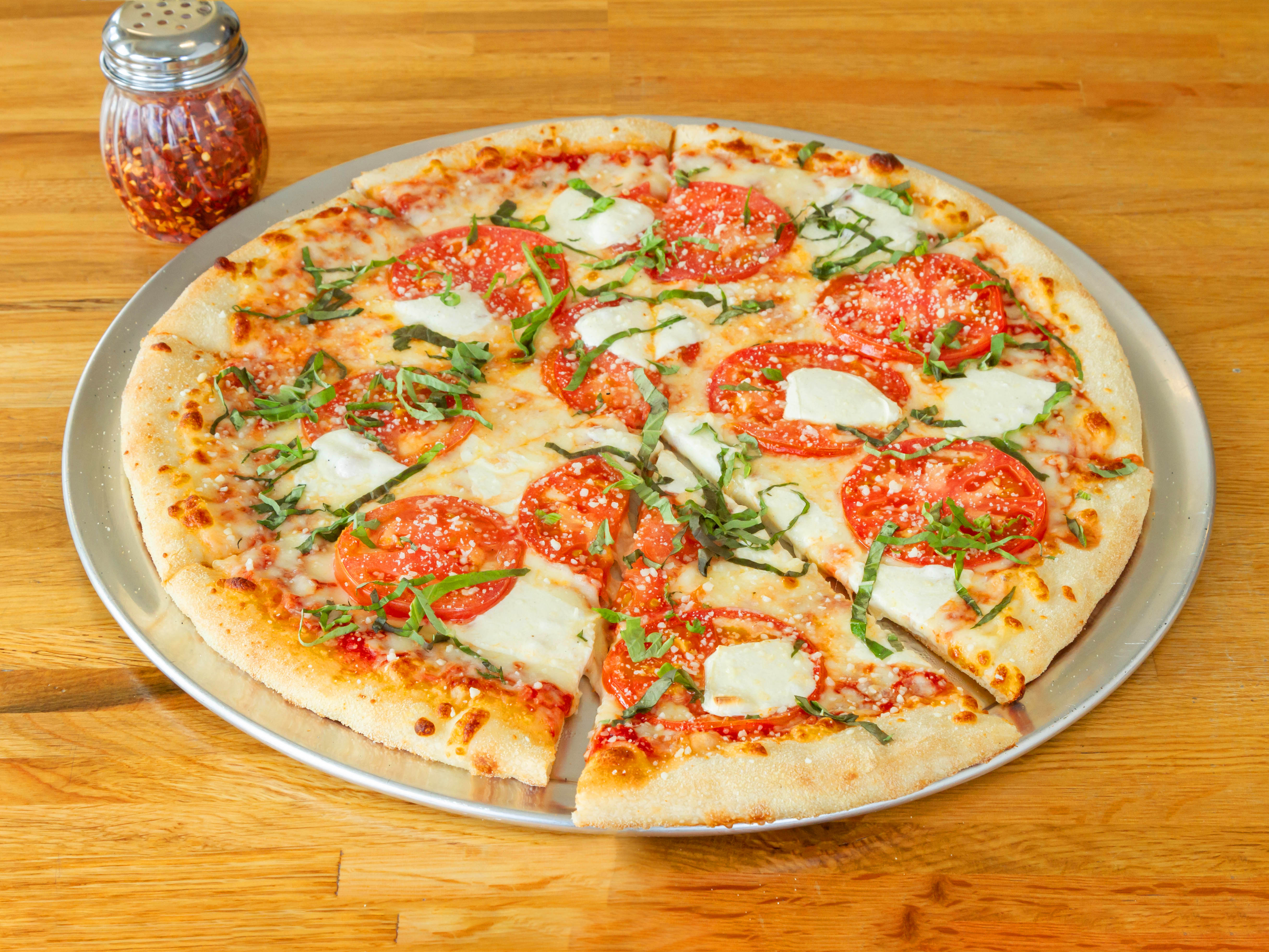 Order 1. Margherita Pizza food online from Lisa’s Family Pizzeria store, Belmont on bringmethat.com