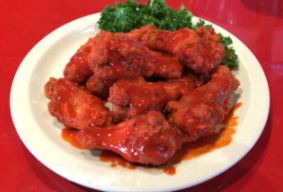 Order Classic Buffalo Wings food online from Wolfies Restaurants & Sports Bars store, Sugar Land on bringmethat.com