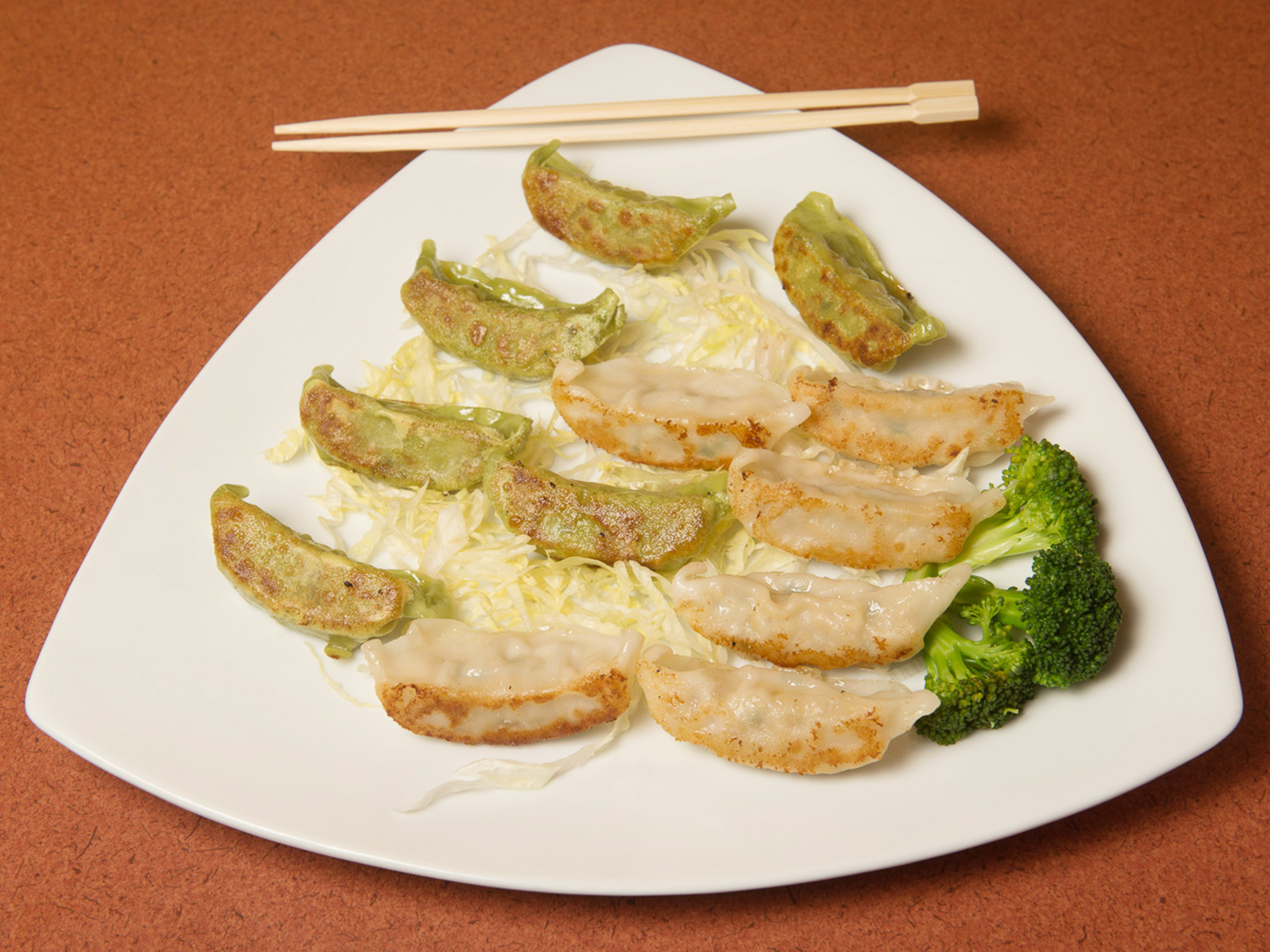 Order 6. Gyoza with Chicken food online from Mr. Sake Sushi & Grill store, Louisville on bringmethat.com
