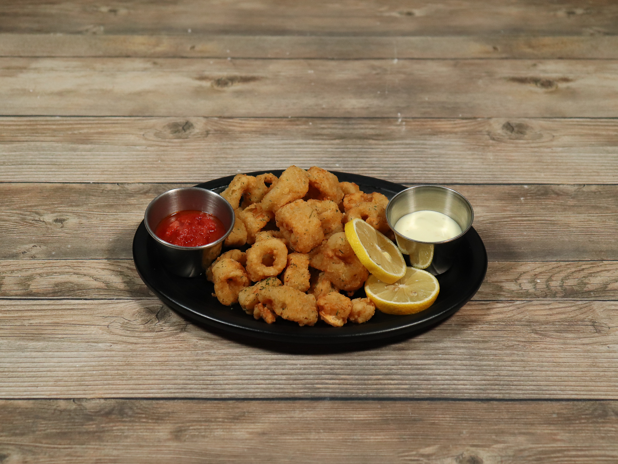 Order Cajun Calamari food online from Wicked Willy's store, New York on bringmethat.com
