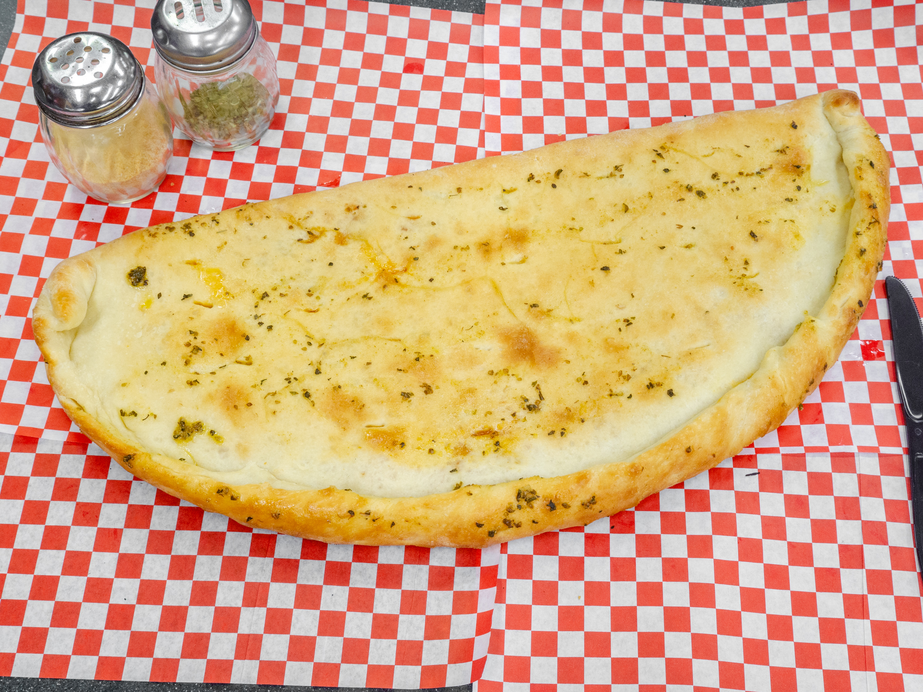 Order Cheese Calzone food online from Giant Manhattan Pizza store, El Cajon on bringmethat.com