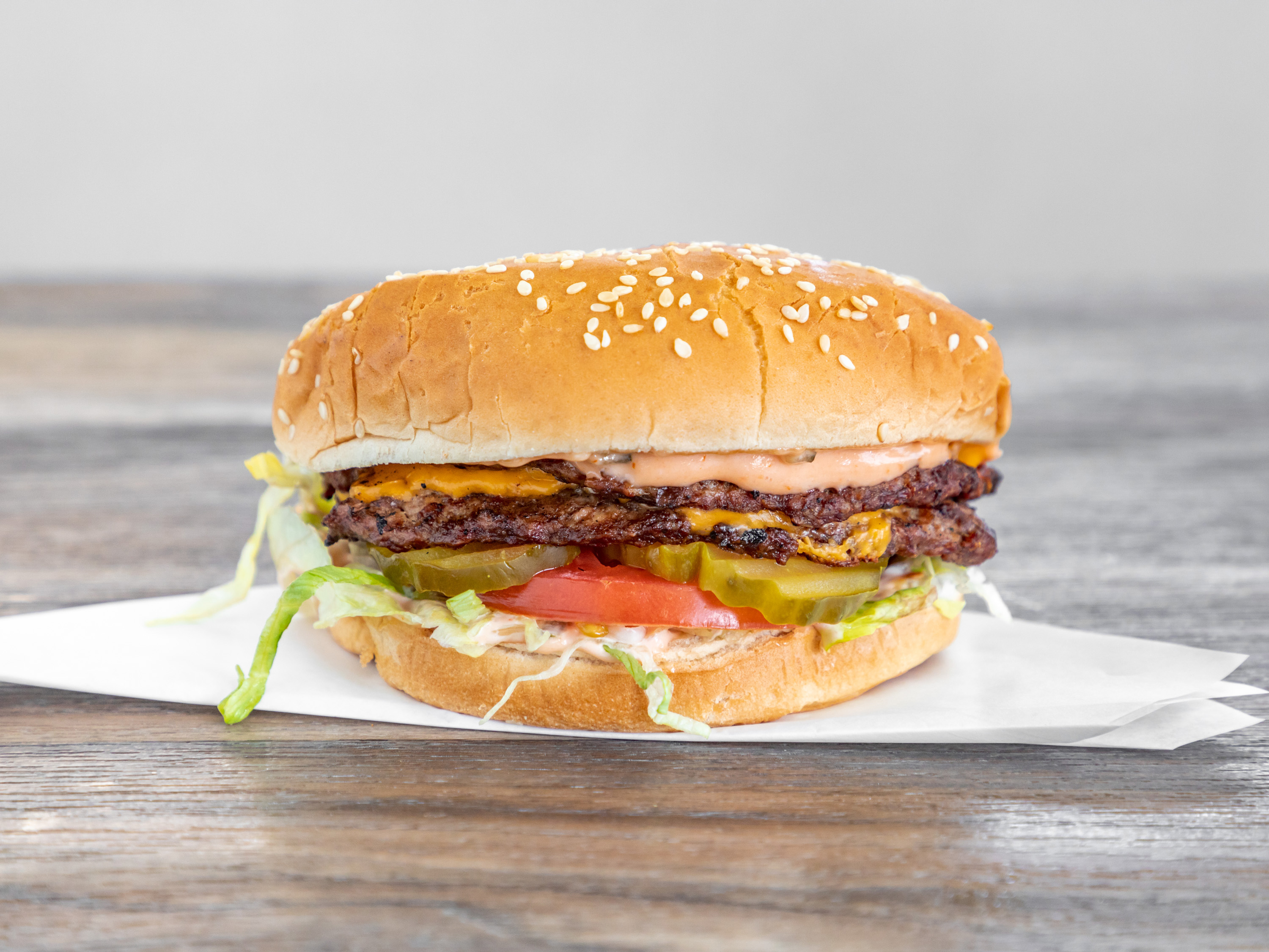 Order Double Cheeseburger food online from Tam Burgers store, Los Angeles on bringmethat.com