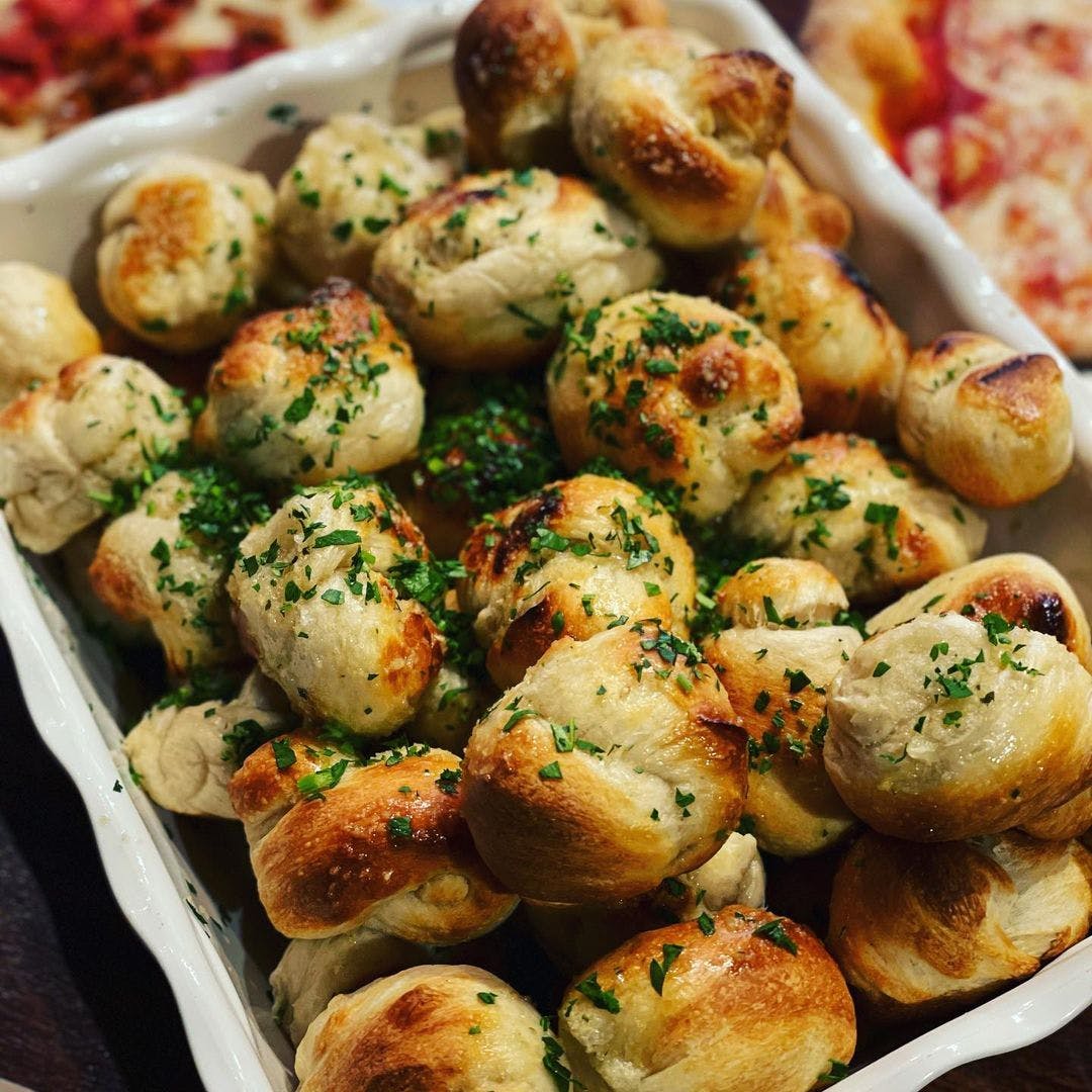 Order Garlic Knots - 6 Pieces food online from Mamma Mia! Cafe & Pizzeria store, New Windsor on bringmethat.com