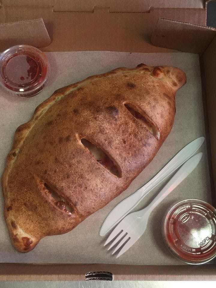 Order Cheese Calzone - Calzone food online from Olive Oil's Pizzeria and More store, Canonsburg on bringmethat.com