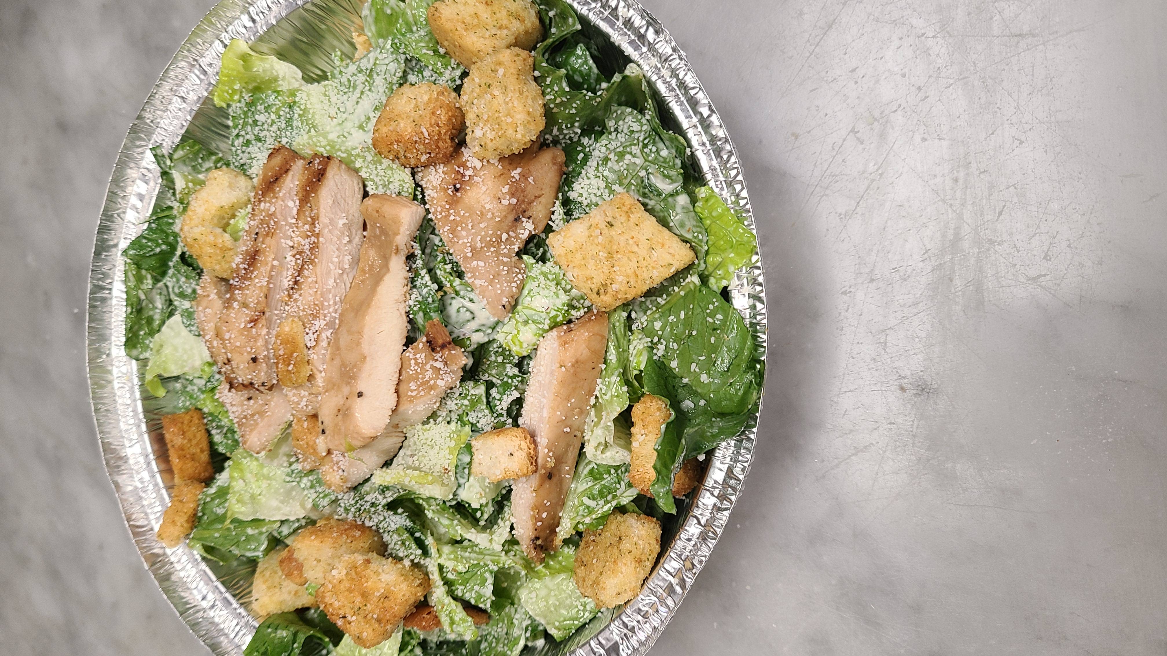 Order Grilled Chicken Caesar Salad food online from Gino's Pizza store, Patchogue on bringmethat.com