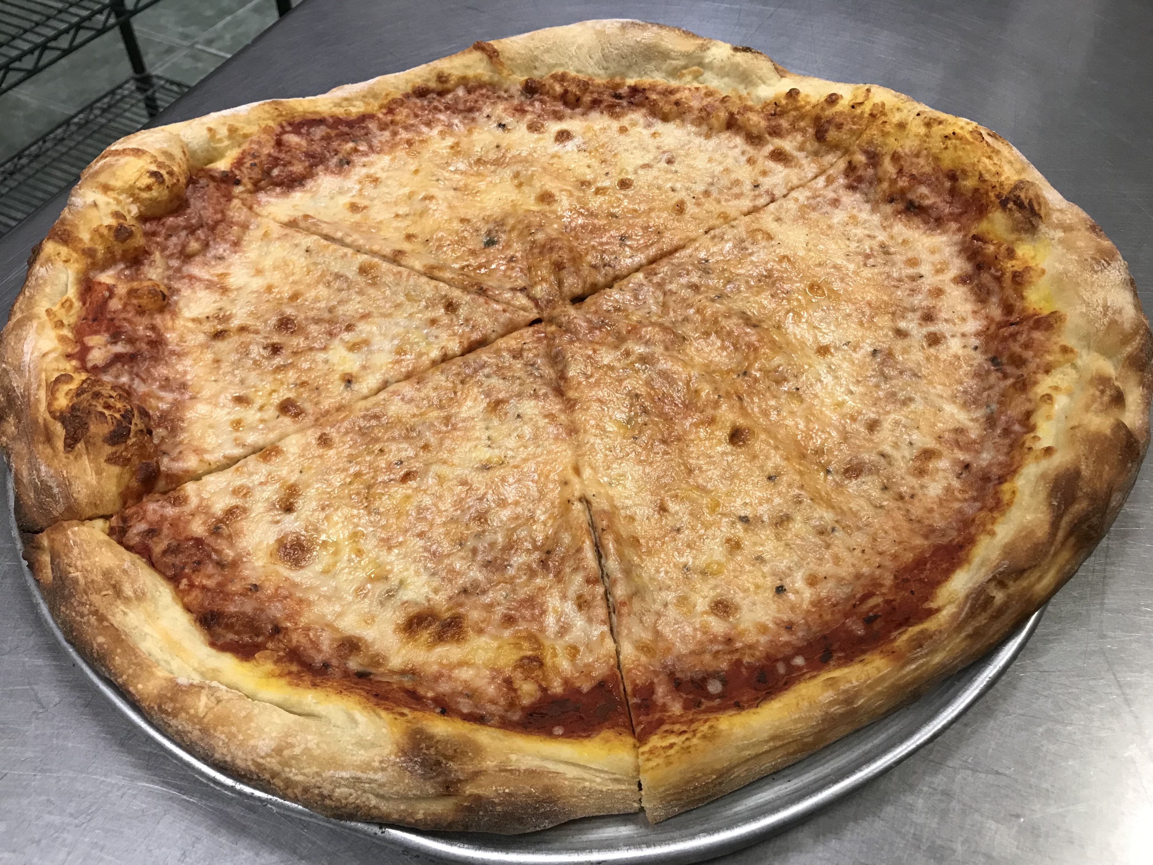 Order 12" Medium Cheese Pizza food online from Papi's Ny Pizza store, Fort Lauderdale on bringmethat.com