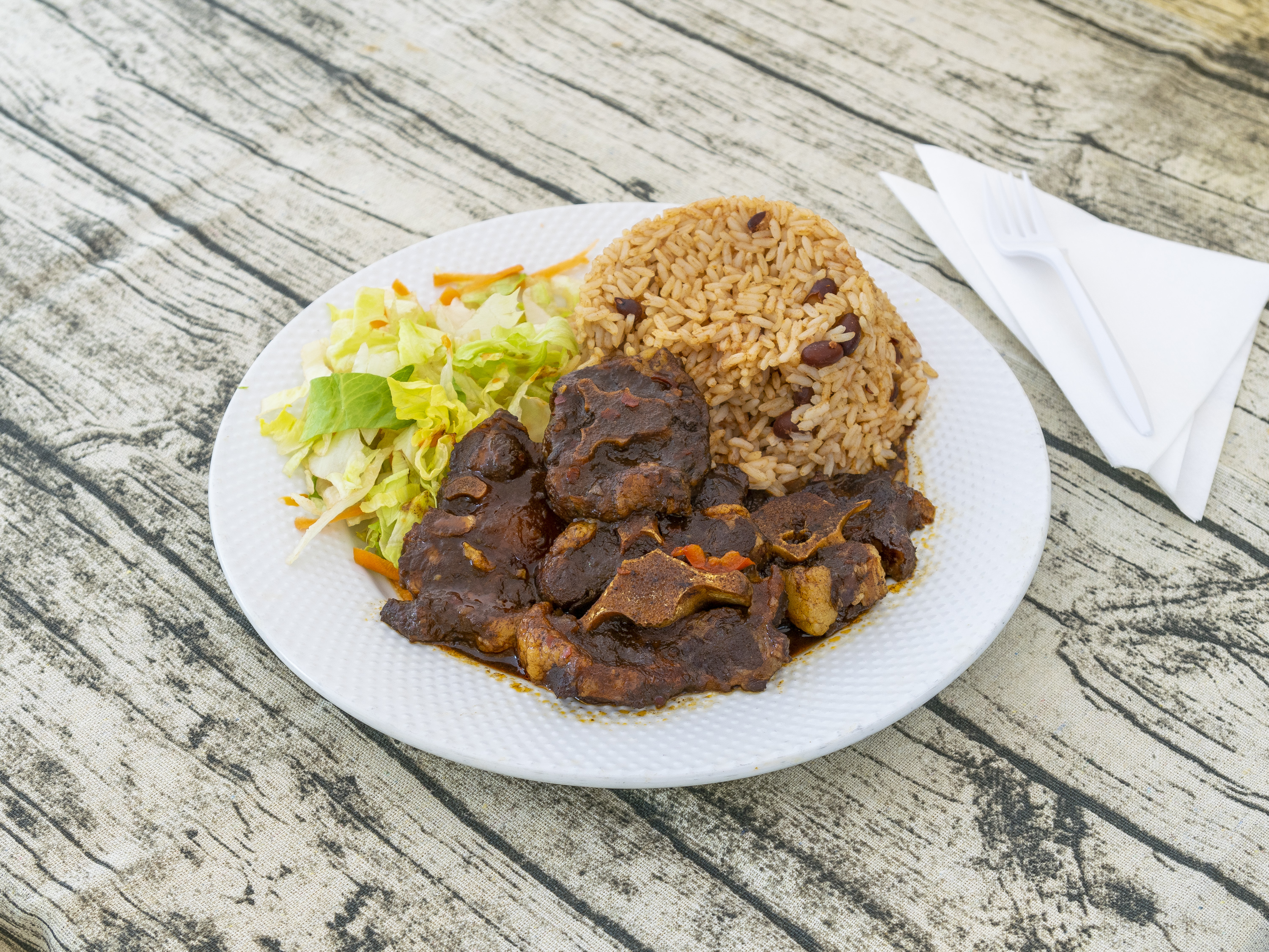 Order Oxtail food online from K&D Jamaican And American Restaurant store, East Orange on bringmethat.com
