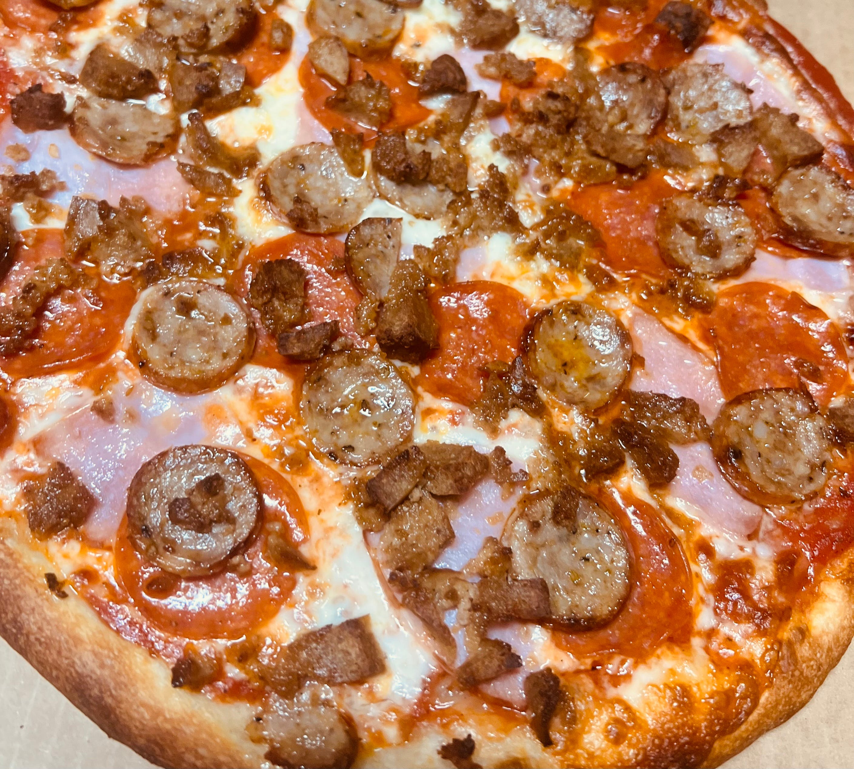 Order Meat Lover's Pizza - Small 12" (8 Slices) food online from Pepe's NY Pizza - 11946 Ventura Blvd store, Studio City on bringmethat.com