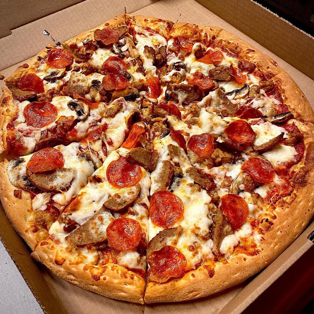 Order Meat Lover's Pizza - Individual 10" (4 Slices) food online from Listrani's store, McLean on bringmethat.com