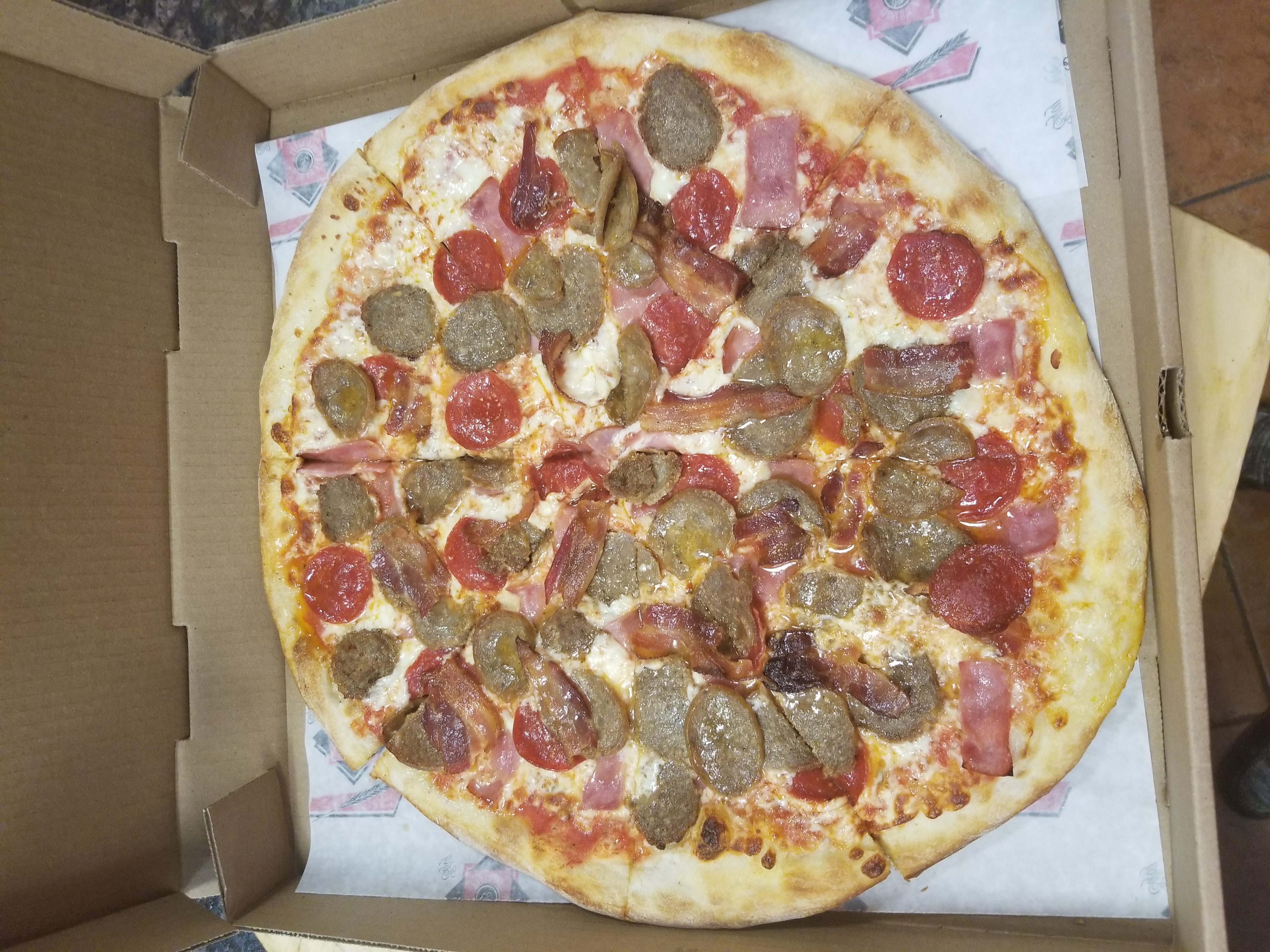 Order Meat Lovers Pizza food online from Mona Lisa Pizza & Grill store, Cambridge on bringmethat.com