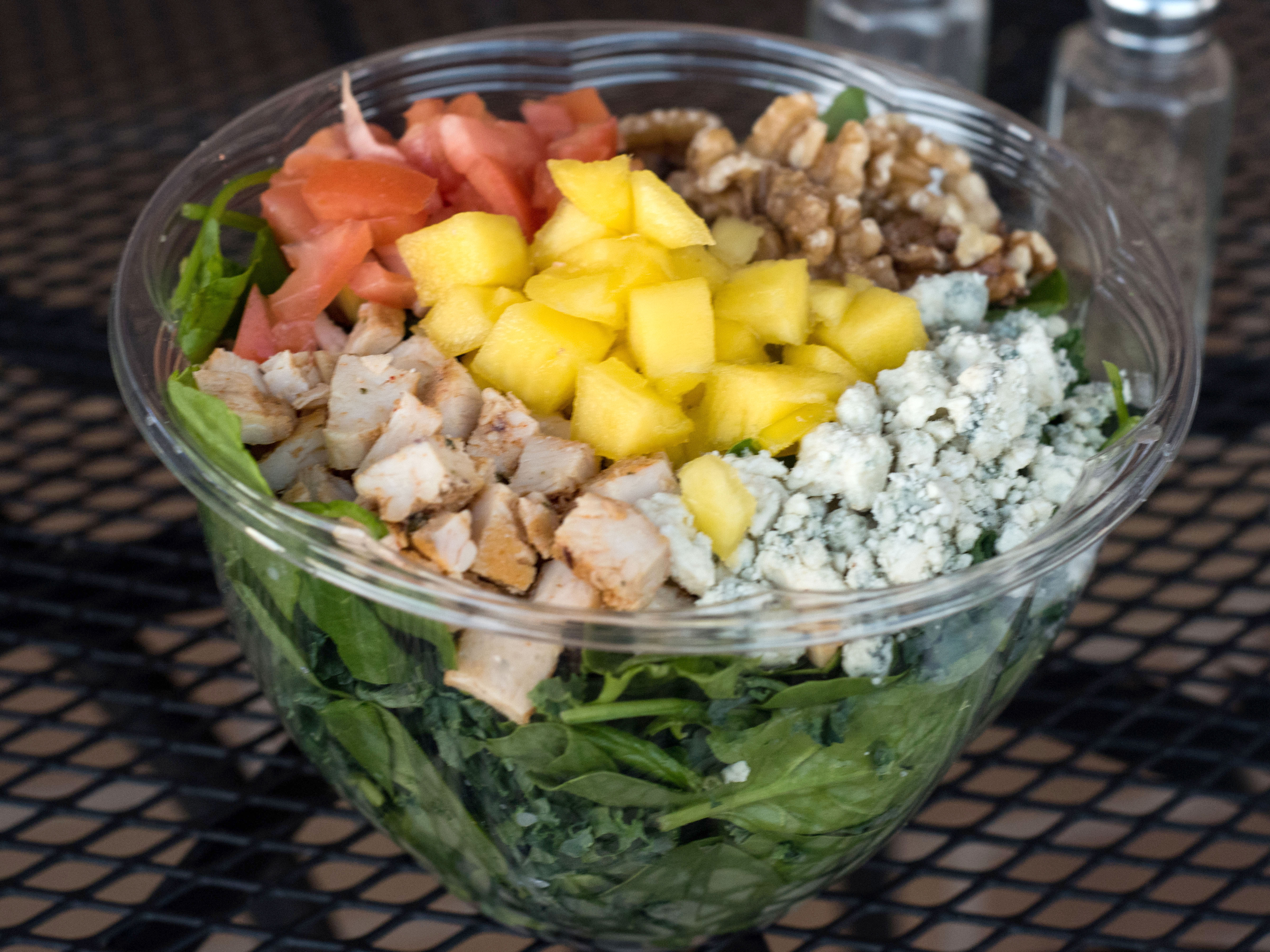 Order Kale Harvest Mango Salad food online from Corner Cafe store, Annapolis on bringmethat.com