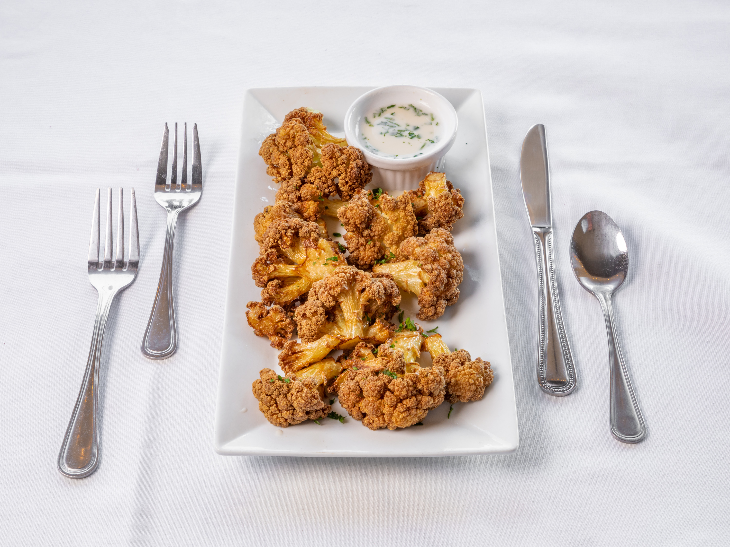 Order Fried Cauliflower food online from Famous Steakhouse store, Tulsa on bringmethat.com